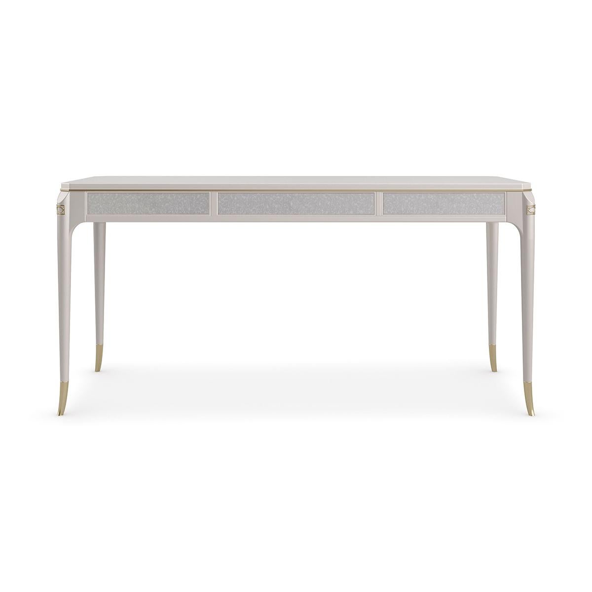 Stardust Transitional desk, for moments of reflection, this desk adds a note of glamour in our pearlescent Stardust finish. Platinum-striped beading accentuates its clean-lined design, featuring a spacious desktop and drawers with antique mirrored