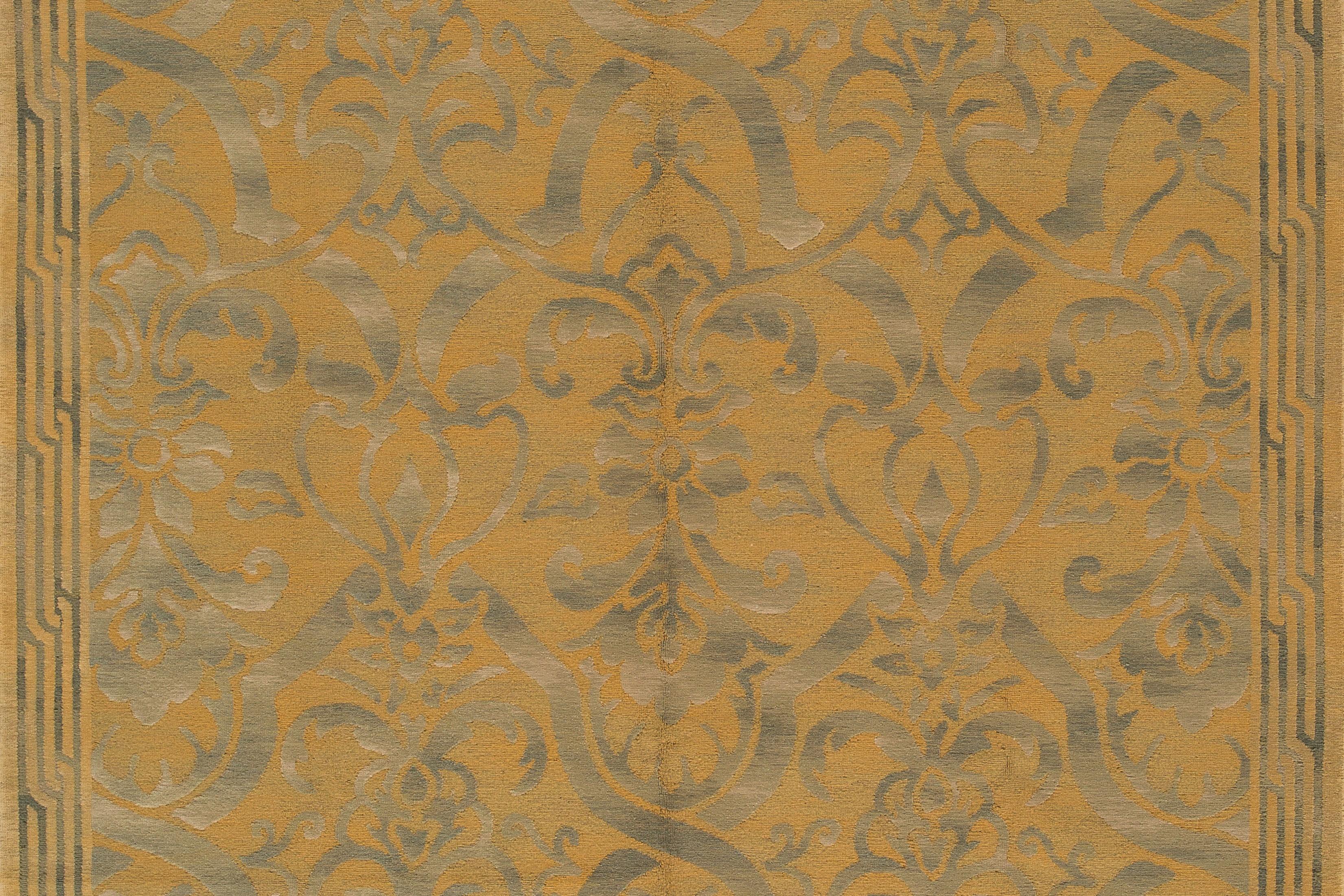 21st century transitional Nepalese rug with an all over gold floral motif. This rug measures 8'10