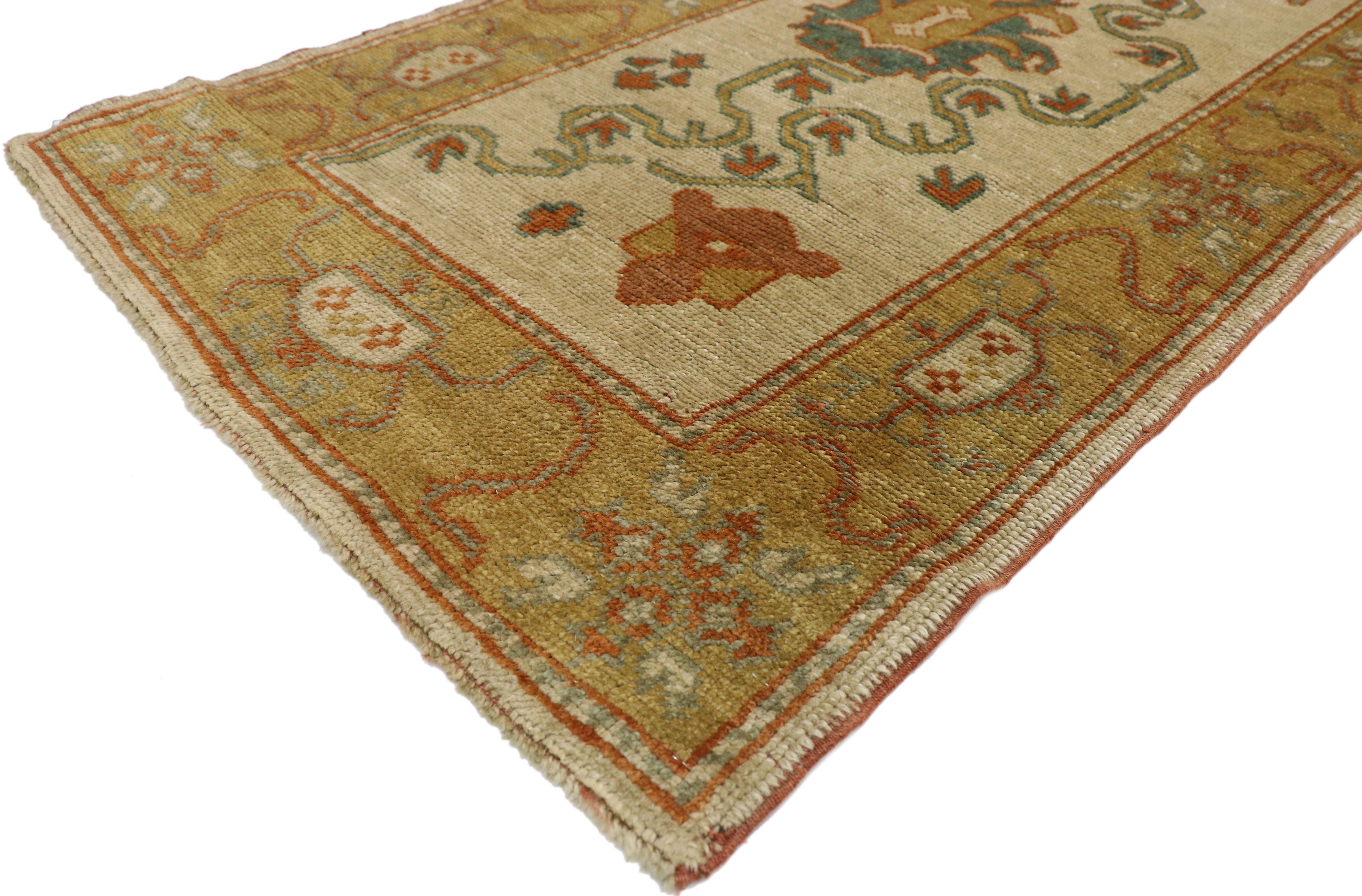 74237, transitional style Turkish Oushak runner. This hand-knotted wool transitional style Turkish Oushak hallway runner can make an interior space feel warm and welcoming yet elegantly understated. Featuring a central design composed of long green