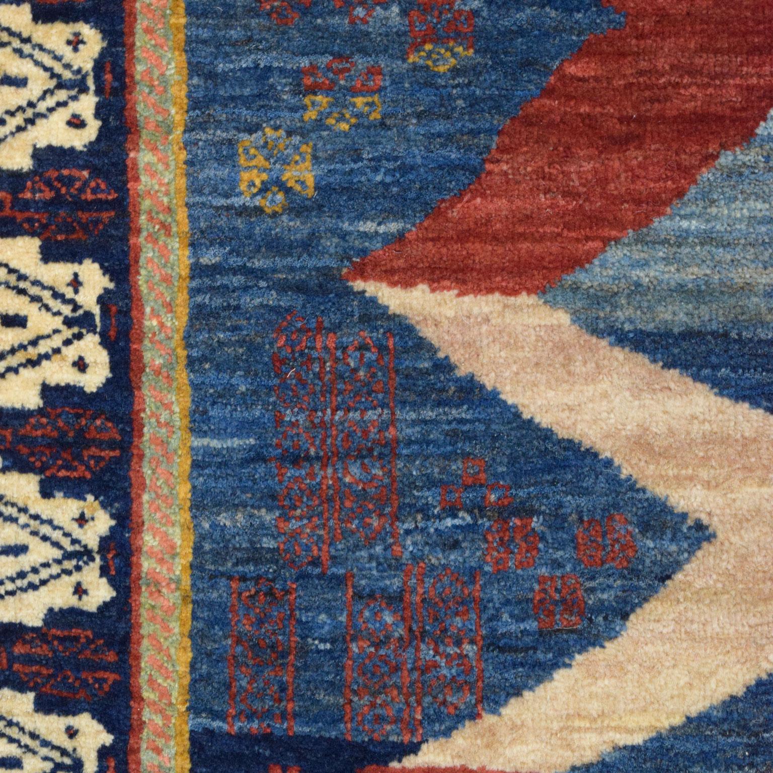 Contemporary Wool Persian Qashqai Rug, Tribal and Transitional, Blue, Red, Green, 4’ x 6’ For Sale