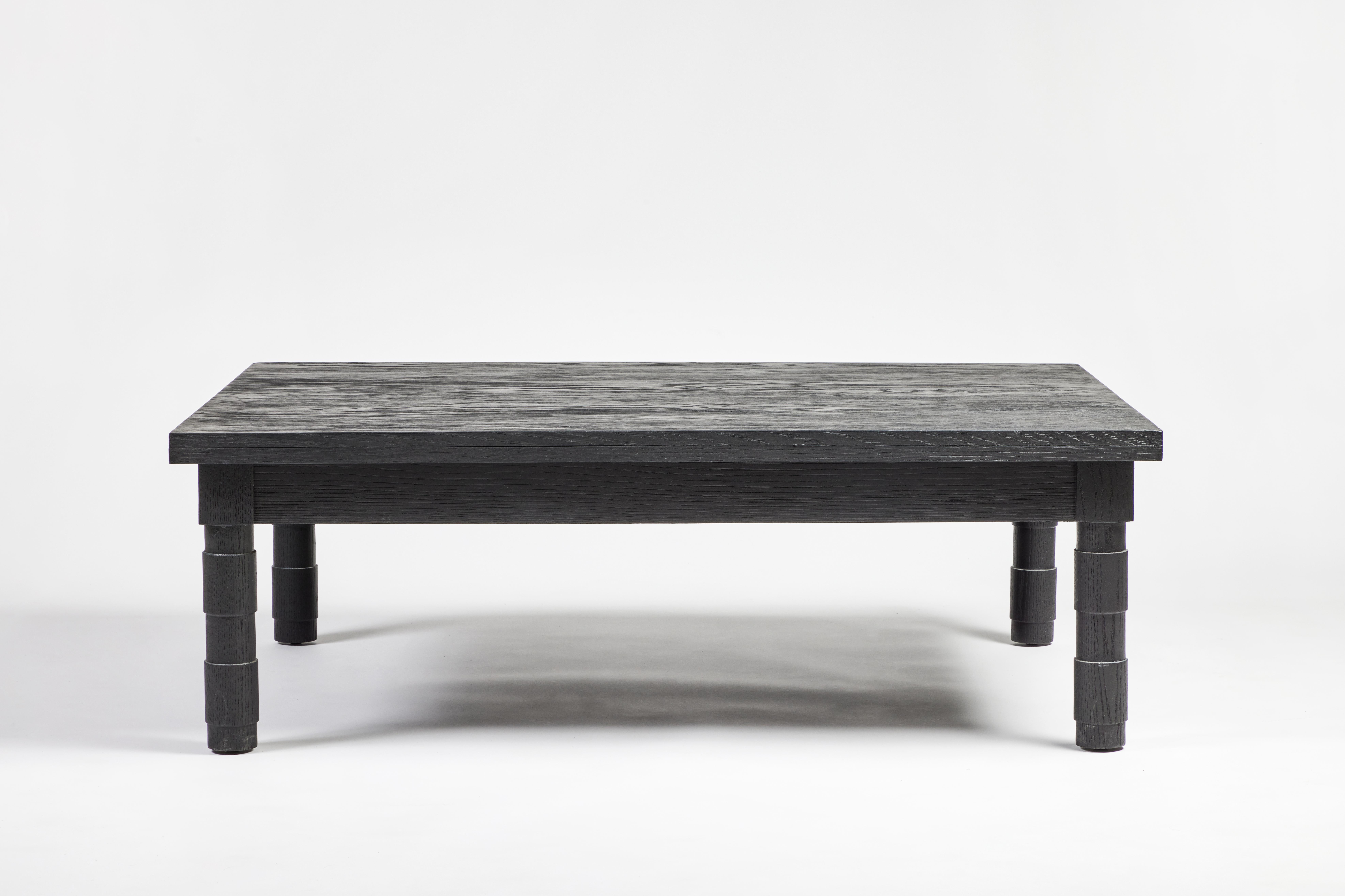 Martin & Brockett's Jenks Coffee Table features a low profile and clean-lined transitional turned legs. Shown in Ebony on Oak.

H 16 in. x W 48 in. x D 36 in.

Available in additional sizes and finishes.

Part of M&B’s Jenks Collection.

Lead time: