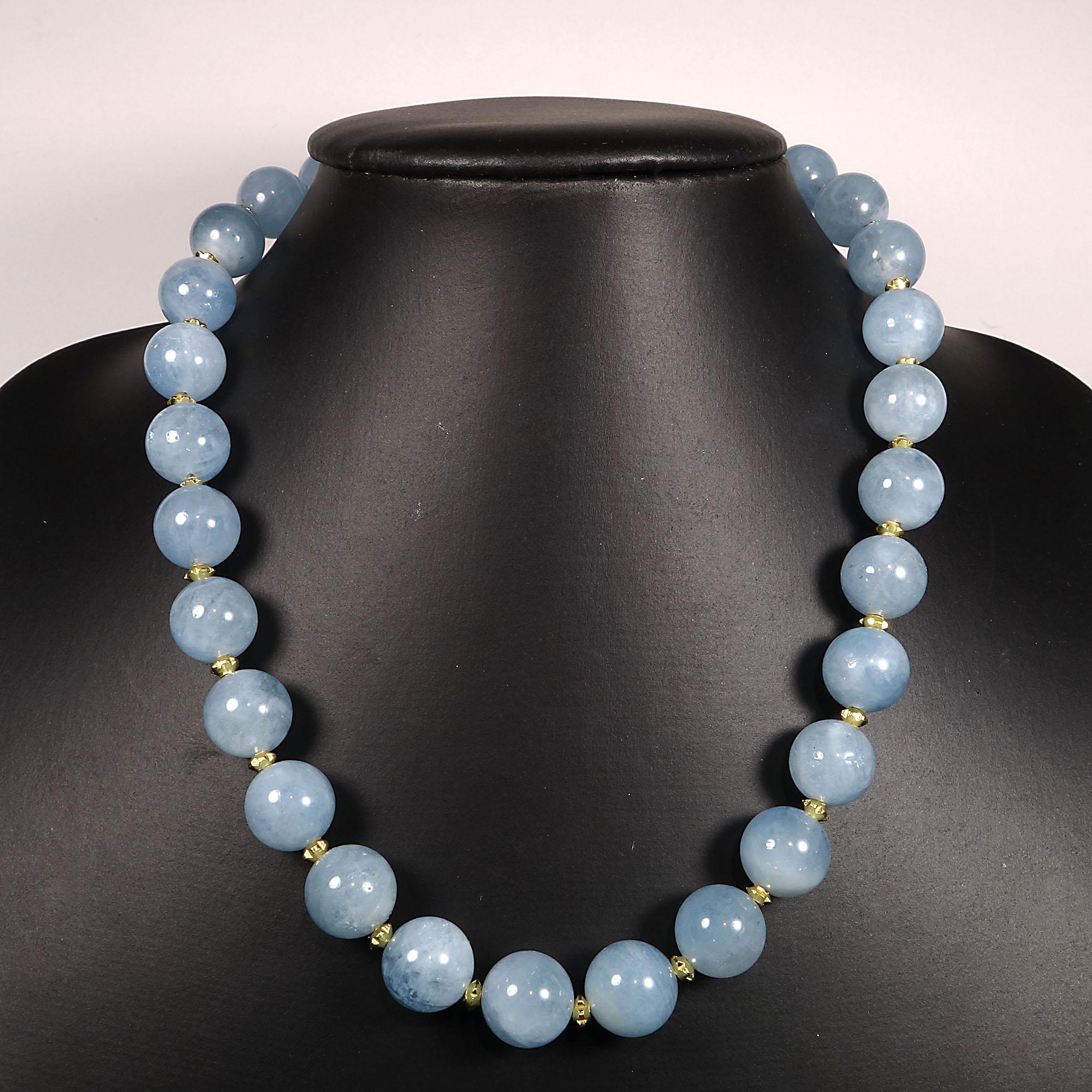 16.5 Inch translucent 12MM Aquamarine with gold tone enhancements choker necklace.  This handmade choker necklace is secured with a 14K gold plated hook and eye.  Aquamarine is the March birthstone.
