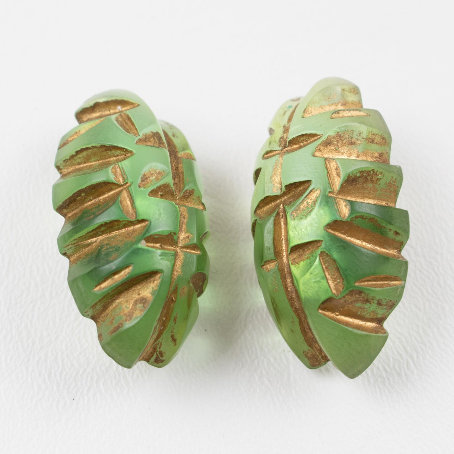 Modern Translucent Green Lucite Clip Earrings with Gilt Application Carving For Sale