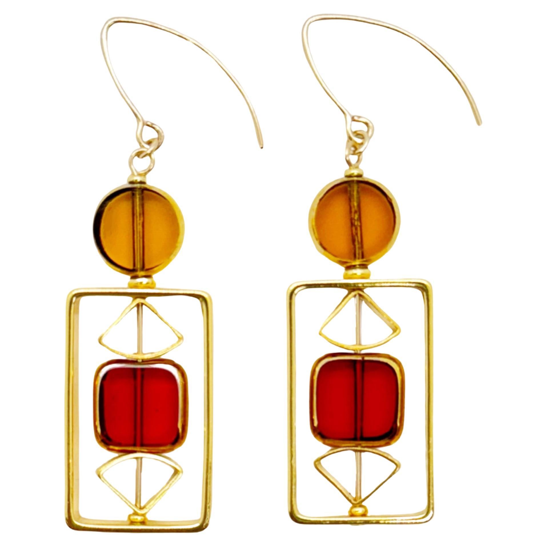 Boucles d'oreilles Art Deco 2415E en perles de verre allemandes translucides jaunes et rouges en vente