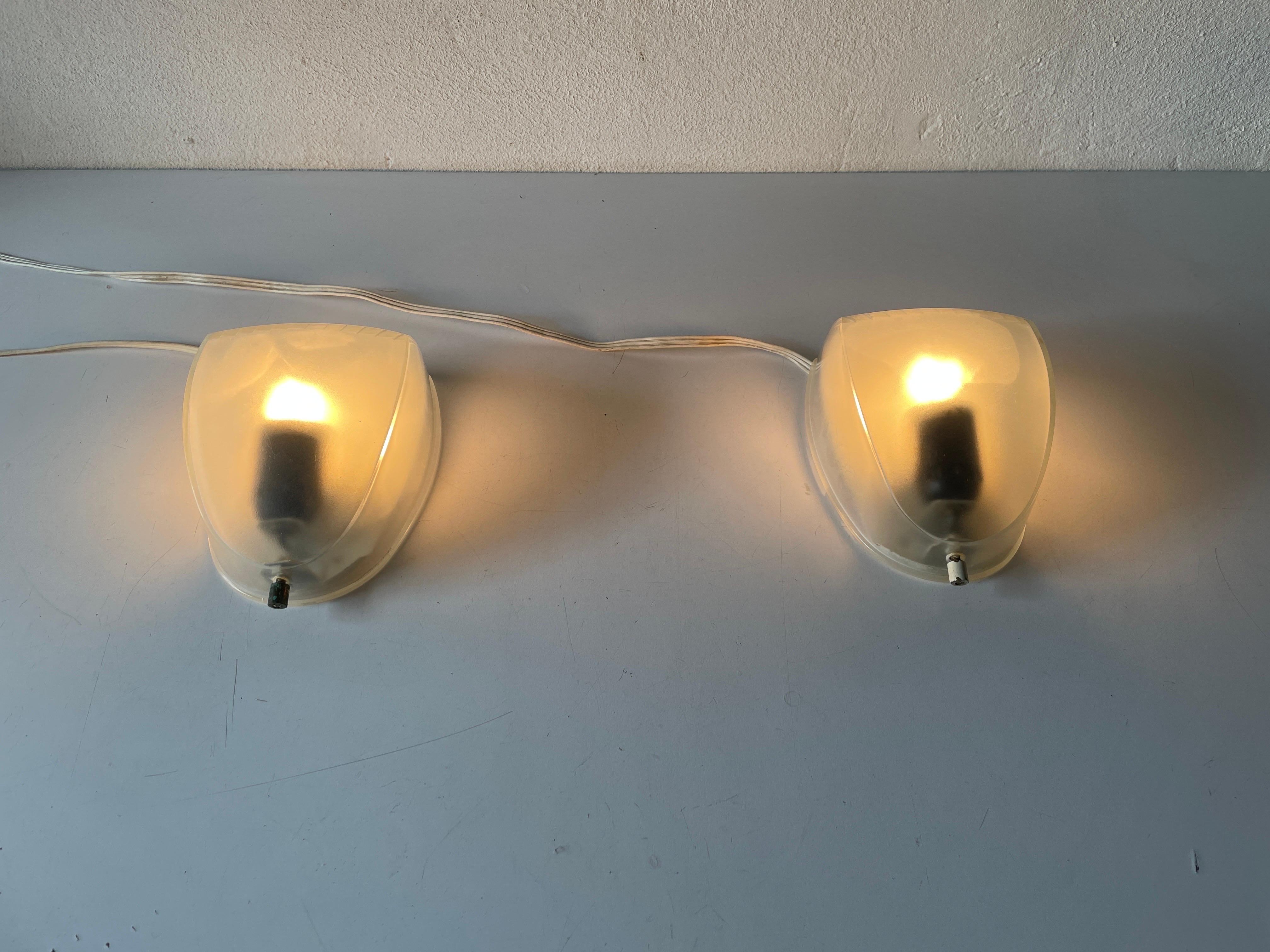 Metal Transparent Glass Pair of Sconces by Artemide, 1970s, Italy For Sale