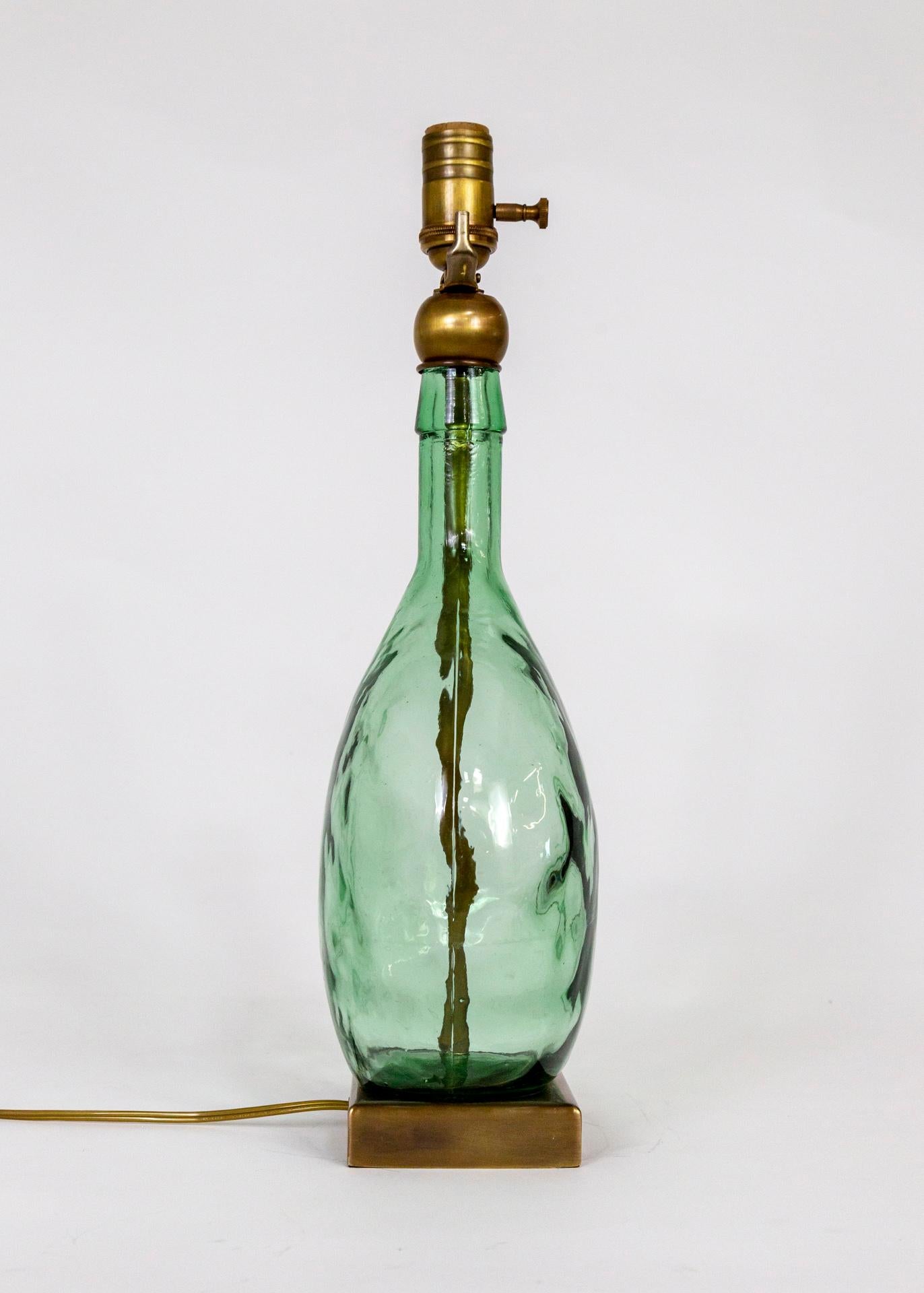green glass bottle lamp