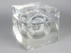 Transparent methacrylate cube-shaped box with an inner sphere