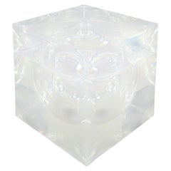 Transparent methacrylate cube-shaped box with an inner sphere