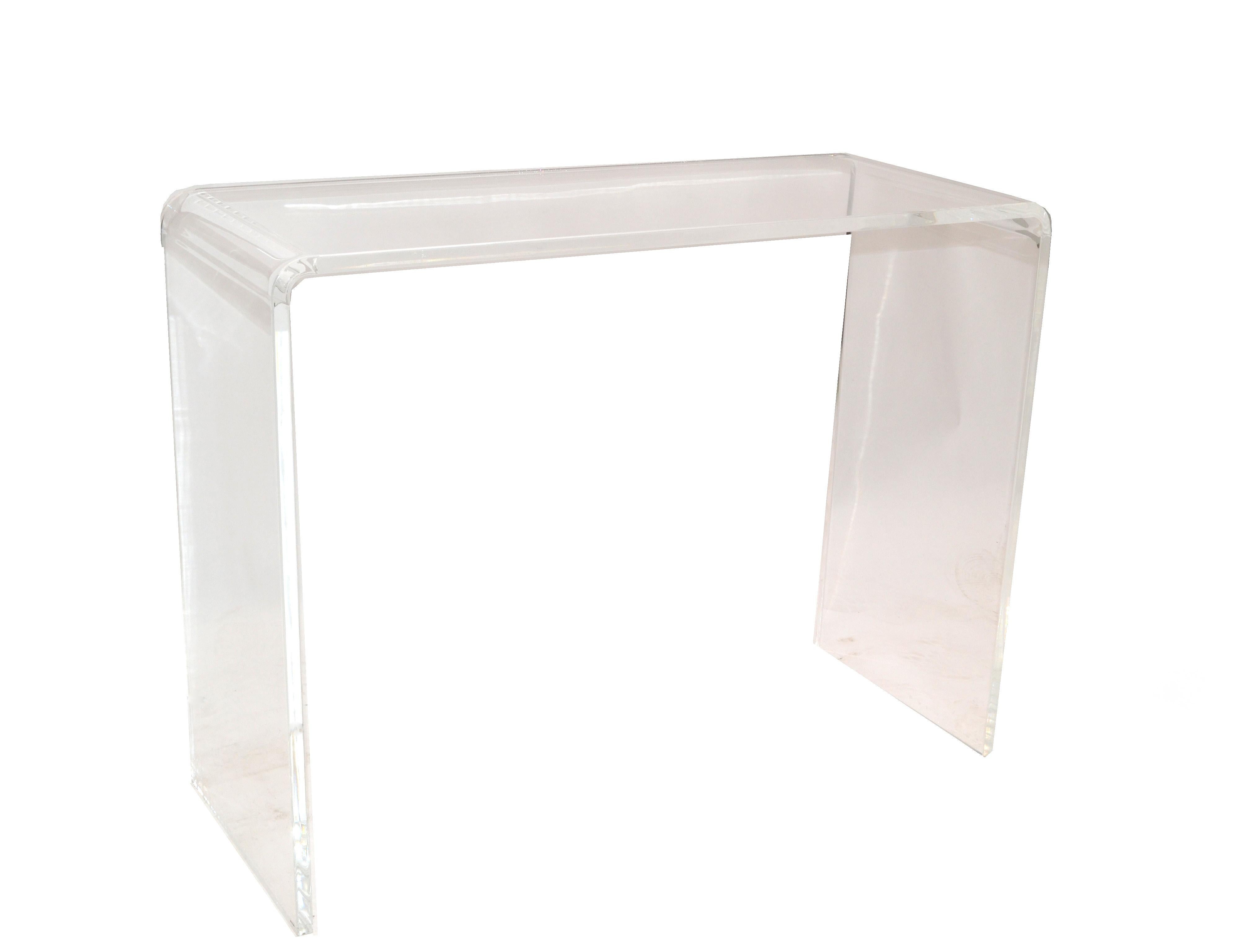 Mid-Century Modern transparent waterfall Lucite console table or hallway table.
The Lucite is 3/4 inches thick.
A great Mid-Century Modern classics.