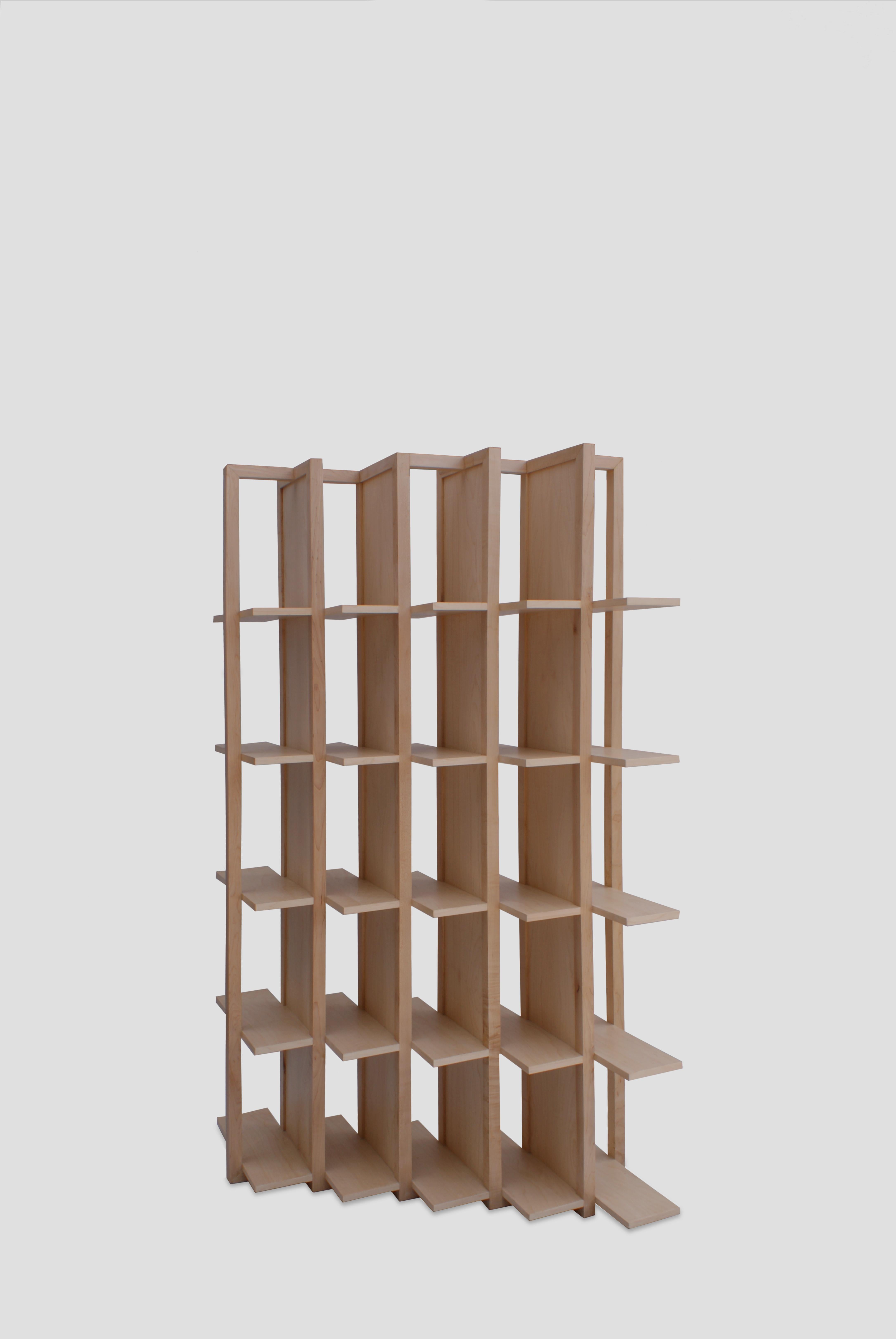 Transversal shelves by FOAM
Dimensions: D 125 x W 45 x H 200 cm
Materials: maple wood.
Available in other woods.

Bookshelf made of maple, walnut or tzalam wood.

Foam is a design and visual experimentation company in Mexico City that was