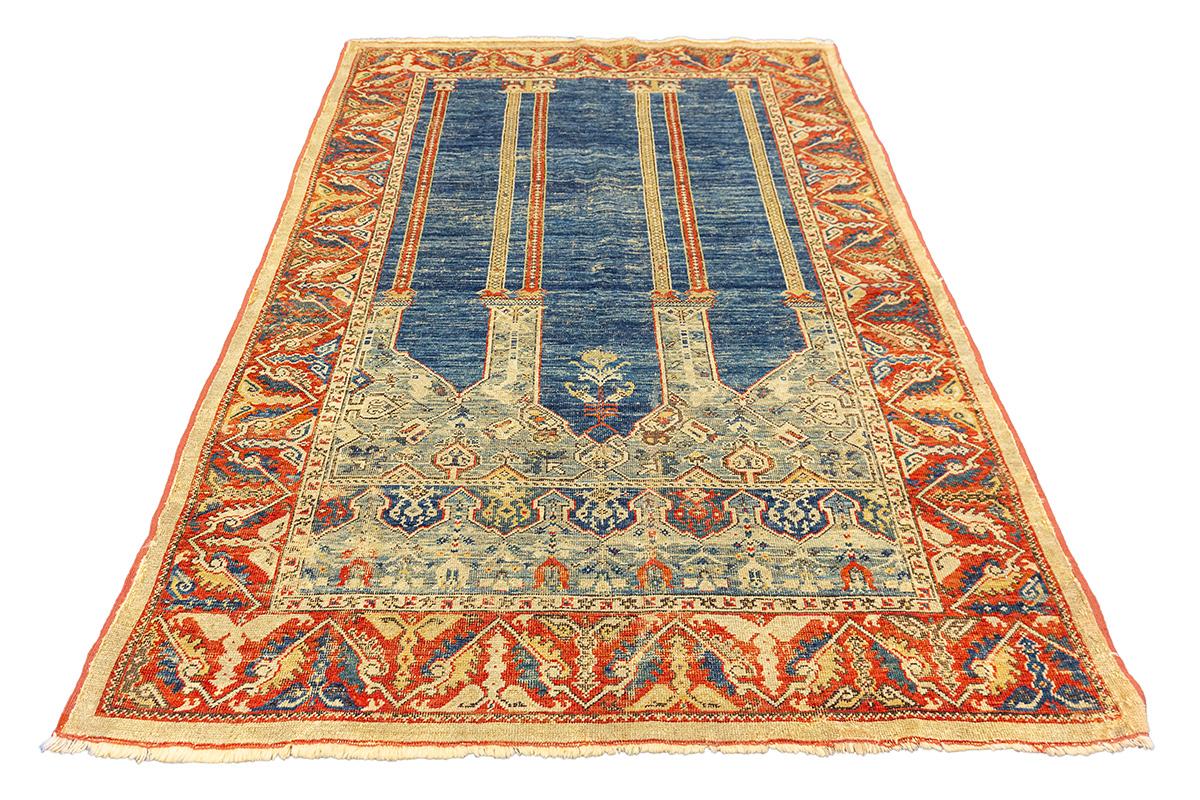 This rare Transylvanian rug is a historical treasure, part of a unique group of Anatolian carpets preserved in Transylvanian churches and castles. Recognized for their hybrid Ottoman-Christian aesthetics, these rugs were often commissioned by Saxon