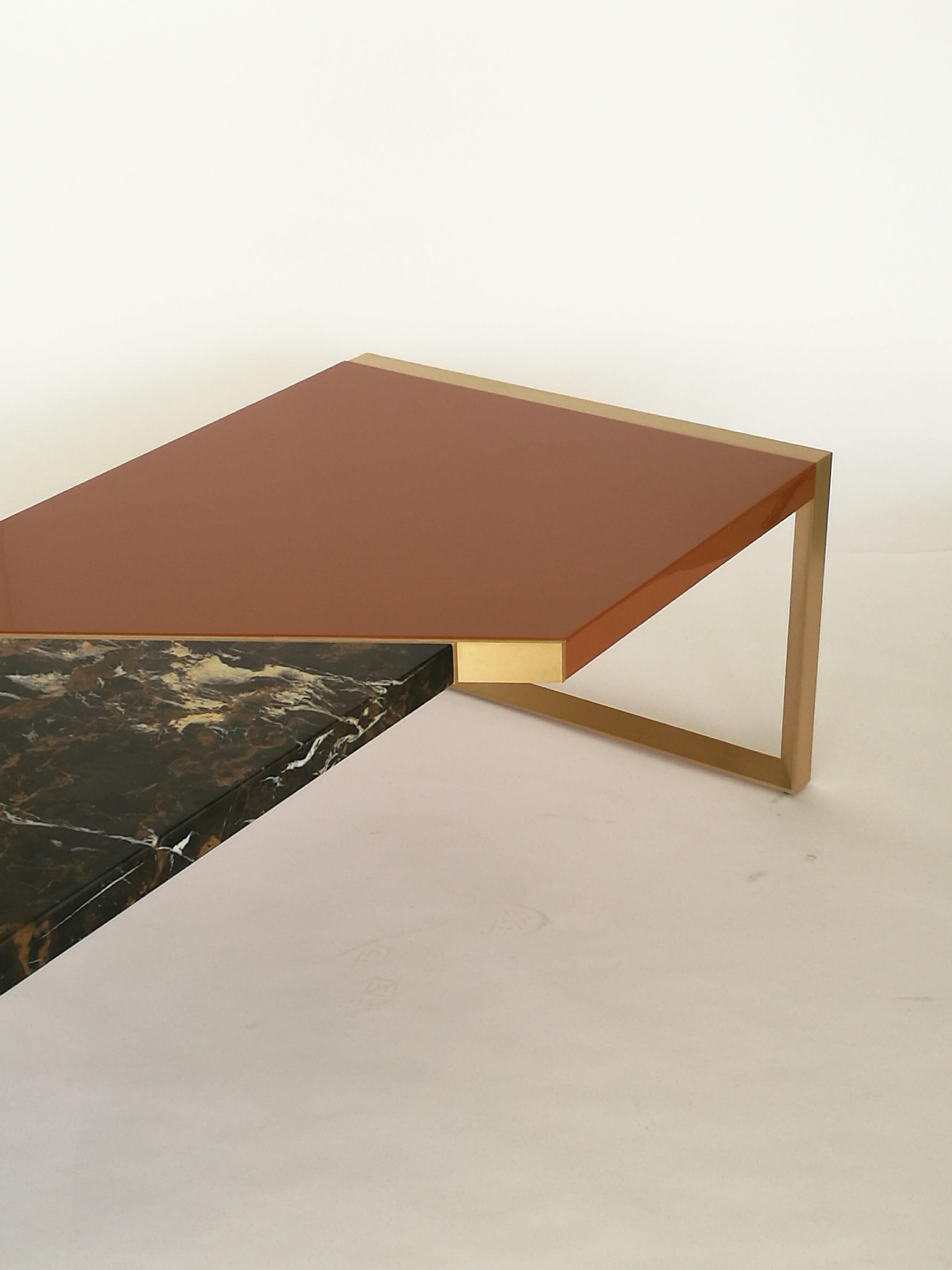Trapeze coffee table by Hagit Pincovici

Materials: Lacquered wood, black and gold marble, brass

Handmade in Italy.