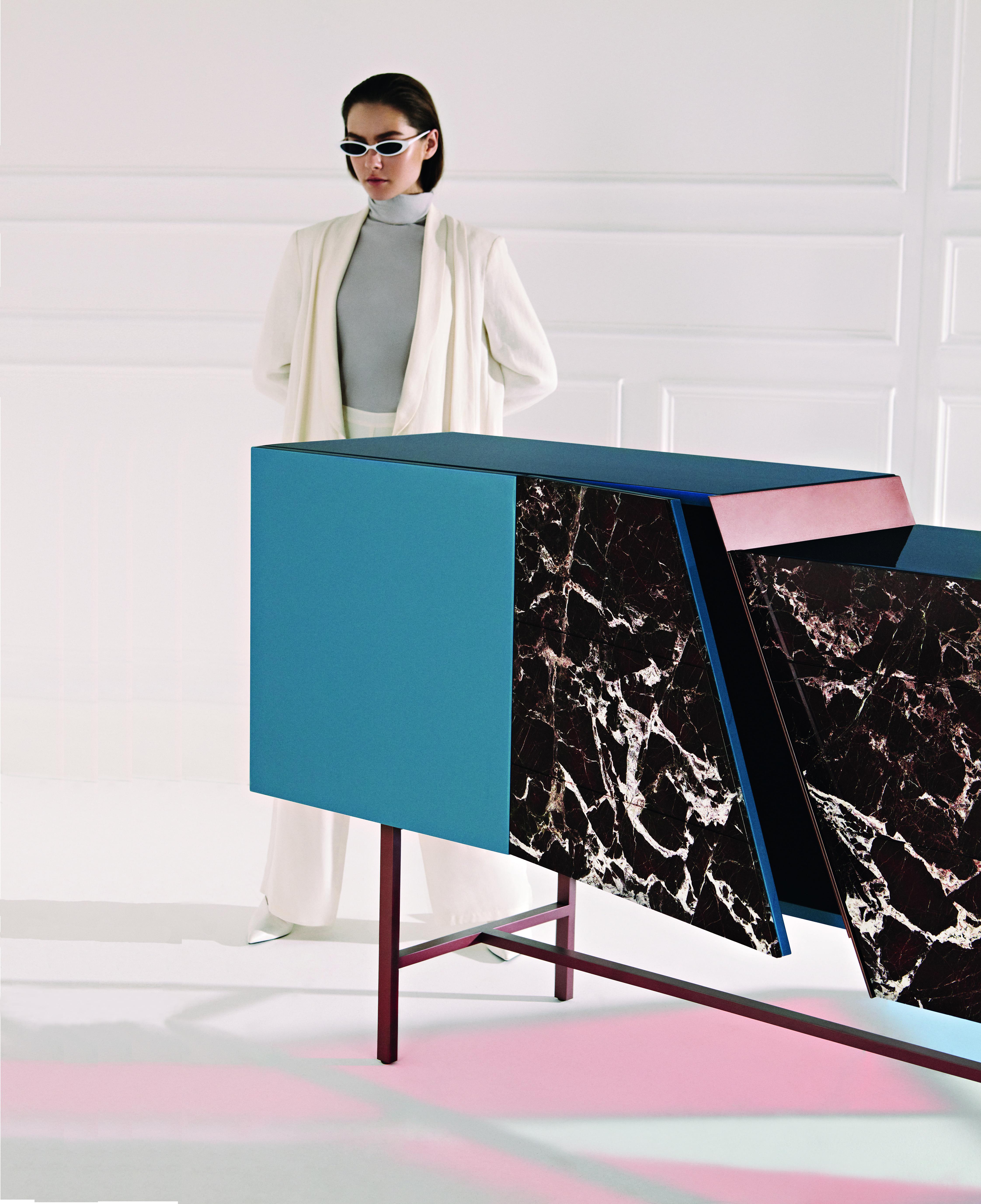 Trapeze sideboard by Hagit Pincovici

Intersections builds on earlier collections “Eclipse” and “Metaphysics”,
creating a simple and harmonious aesthetic, both familiar and contemporary. 
Bold cuts and ‘intersections’ elegantly disrupt the