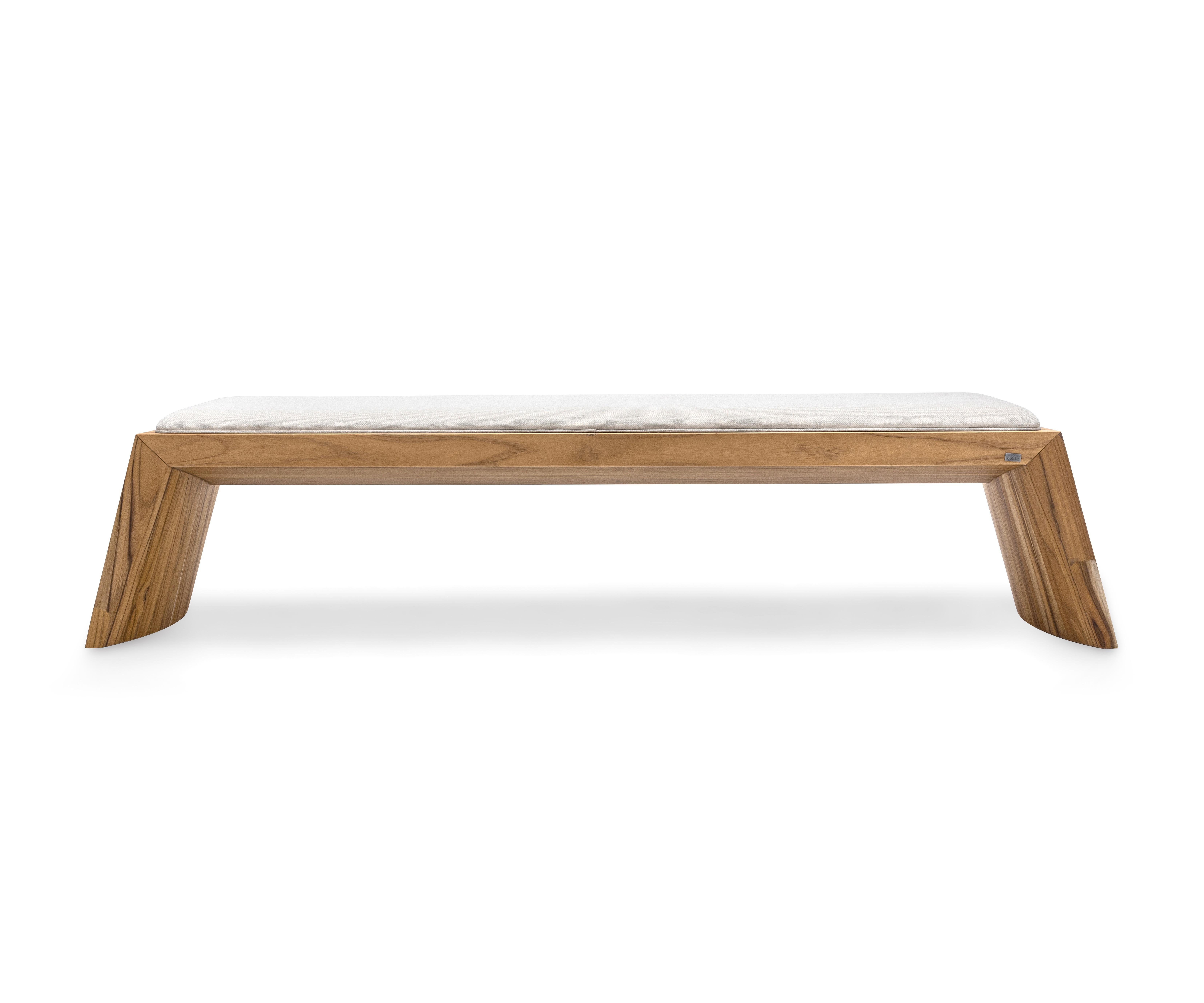 The TRAPÉZIO bench draws inspiration from the trapezoid geometric shape, a plane figure defined by its four sides. This design philosophy underscores its foundation of stability and solidity, distinguishing it as a standout piece. Crafted from wood
