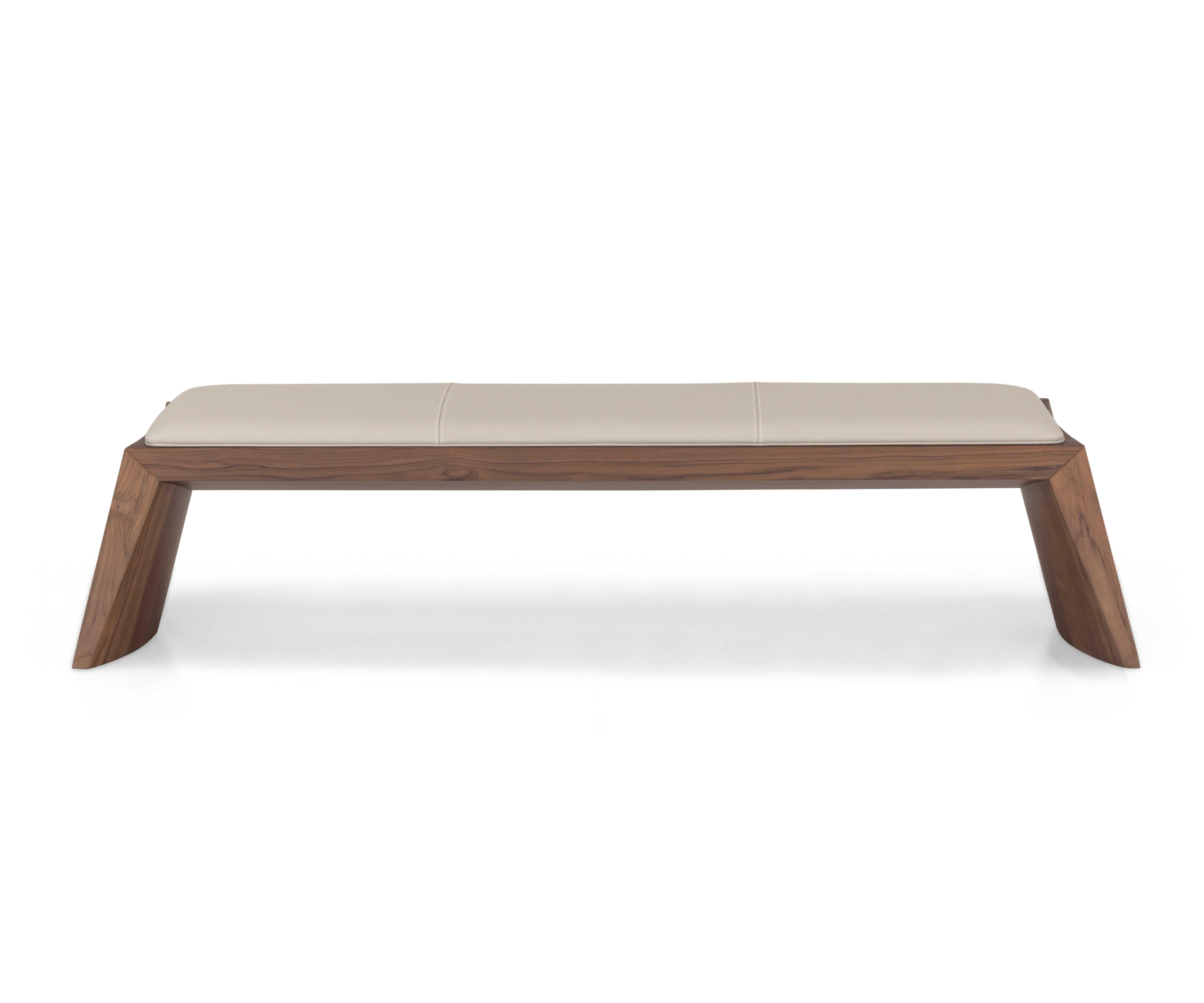 The Trapézio four-seater bench merges architectural precision with modern elegance, making it a refined choice for residential or commercial spaces. Crafted from sustainably sourced teak wood stained in a rich walnut finish, this bench draws its