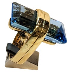 Trapezoid cut blue topaz 18k gold cocktail ring