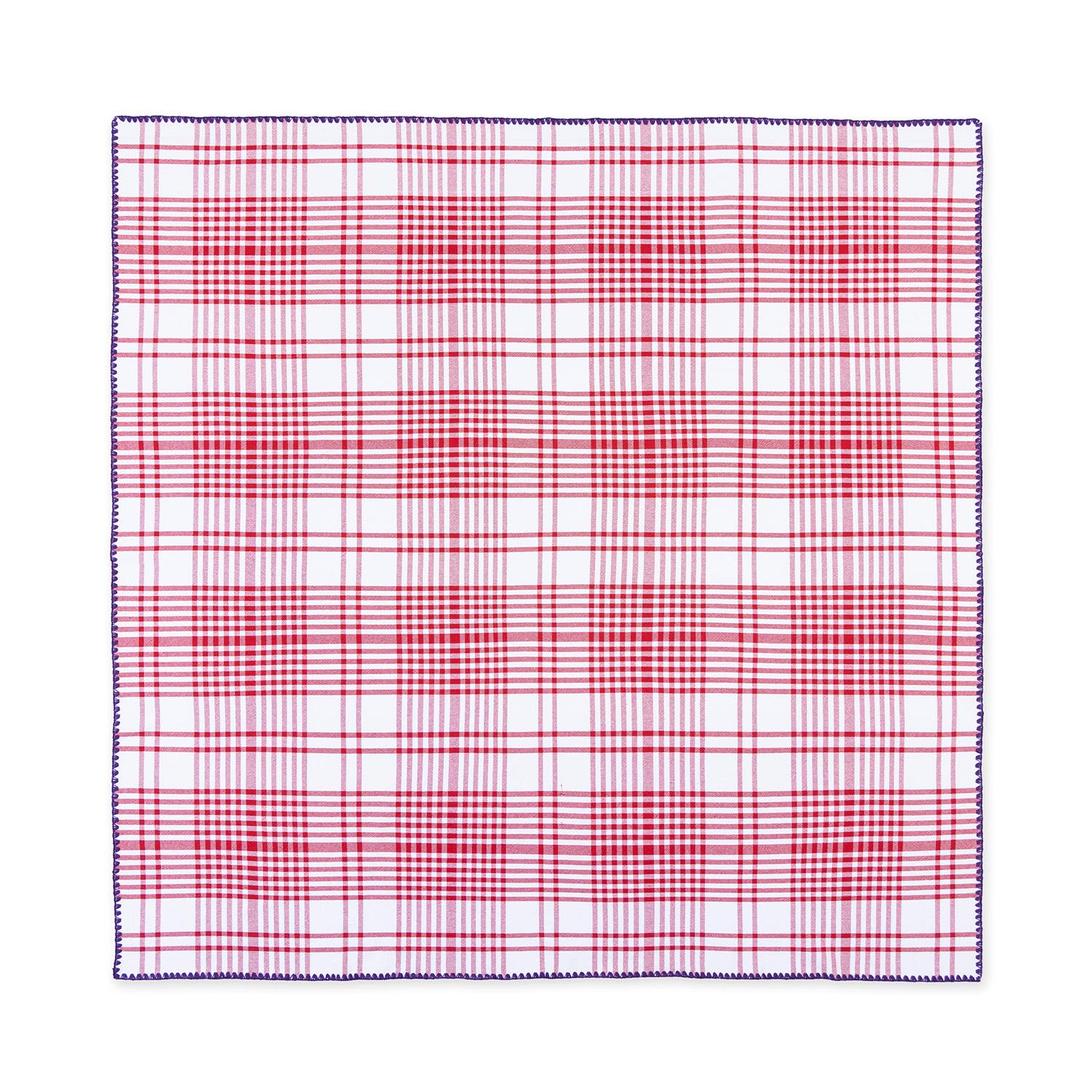 A tribute to traditional trattoria table settings, this cotton check jacquard tablecloth is the perfect dining companion for both indoor and outdoor settings. It features contrasting detail stitching and is available in two sizes. Matching napkins