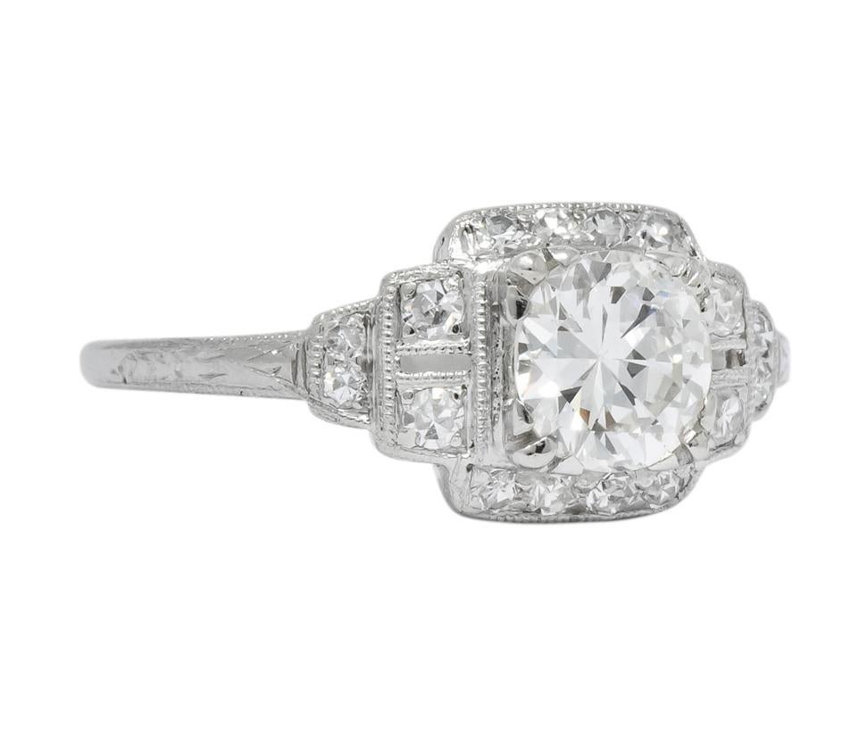 Centering a transitional cut diamond weighing approximately 0.70 carat, H color and VS1 clarity

Surrounded by single cut diamonds weighing approximately 0.15 carat, H/I color and VS clarity

0.85 CTW

Square cushion mounting with pierced stepped