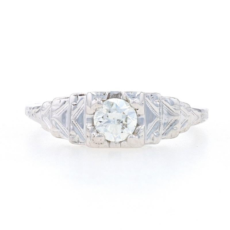 Size: 6
Sizing Fee: Down 1 size for $35 & up 2 sizes for $40

Brand: Traub

Era: Art Deco
Date: 1920s - 1930s

Metal Content: 18k White Gold

Stone Information

Natural Diamond
Carat(s): .33ct
Cut: European
Color: I
Clarity: SI2

Total Carats: