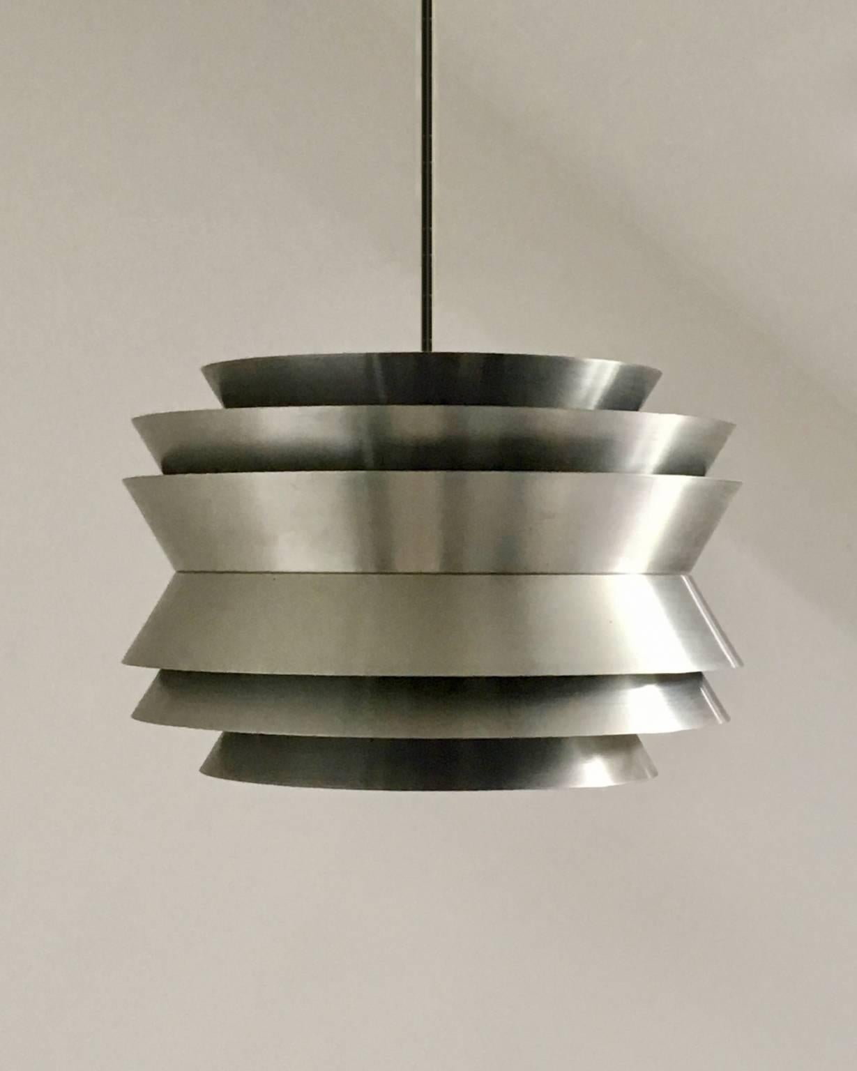 *** Late Summer Sale - ends 30 August.  Please contact us if you would like details of availability of this item. ***

Trava pendant light by Carl Thore for Granhaga, Sweden, 1960s.

A multi-layered pendant light in spun aluminium with purple inner