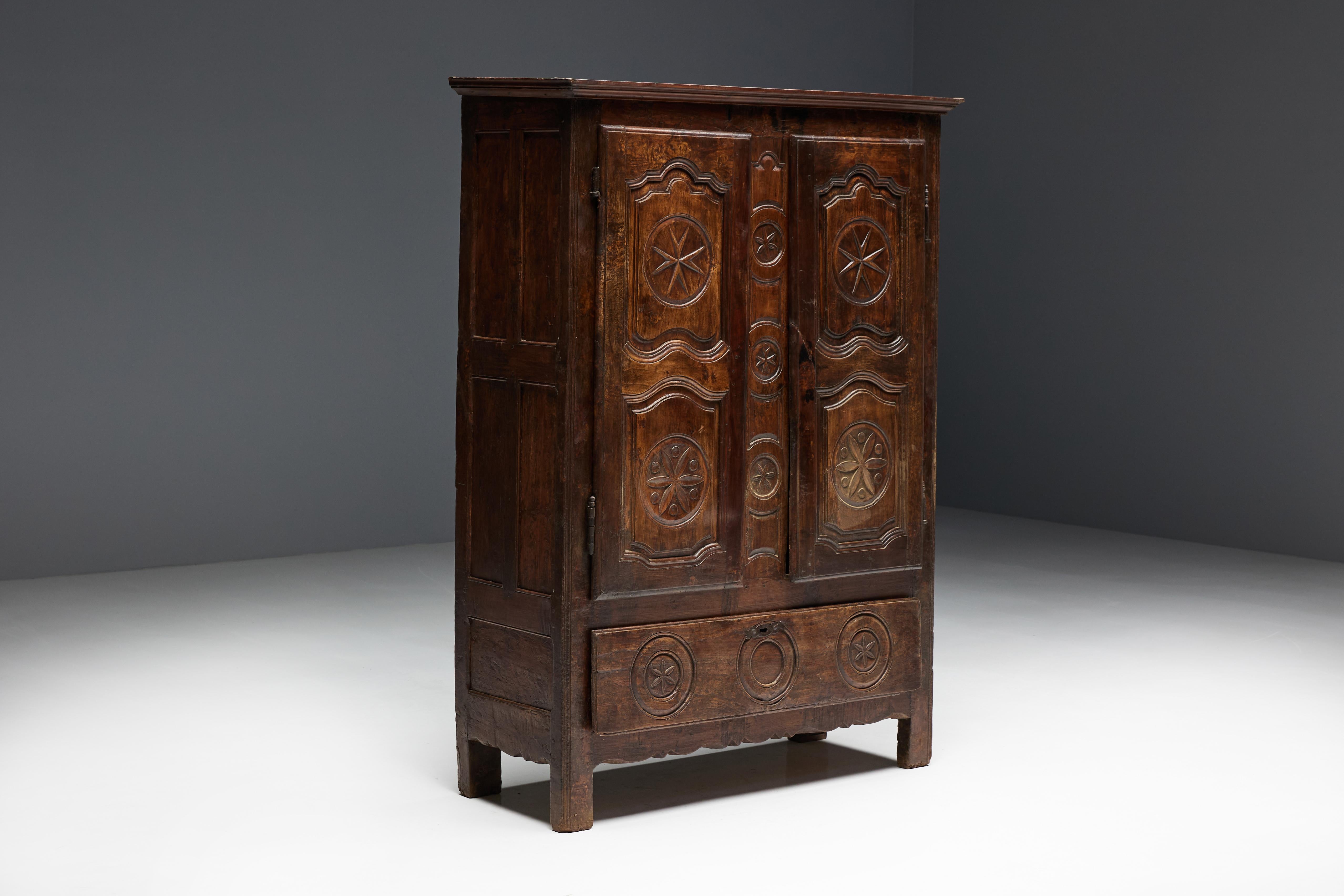 19th-century art popular cabinet, a timeless masterpiece crafted from rich, dark solid wood with unparalleled craftsmanship. Beautiful details carved into the wood showcase the impeccable craftsmanship of that period, making this cabinet a beautiful