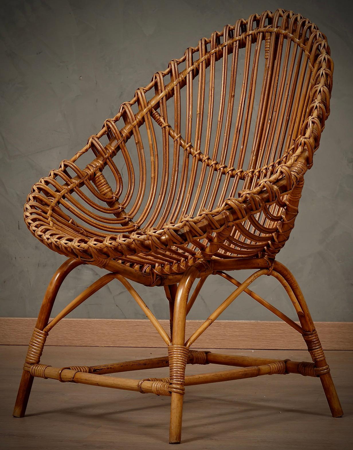 Fantastic series of four rattan chairs by Giovanni Travasa for Bonacina; called 