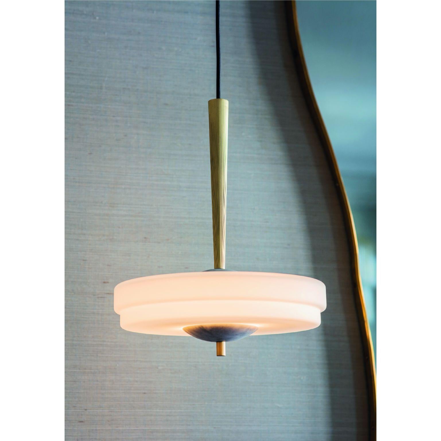 Trave pendant light white by Bert Frank
Dimensions: 60-200 x 30 x 6 cm
Materials: Brass, glass, marble

Available in green or white colors.

Suspended from a reeded, fluted brass stem, the two-tier, soft-finish, opal glass shade with spherical