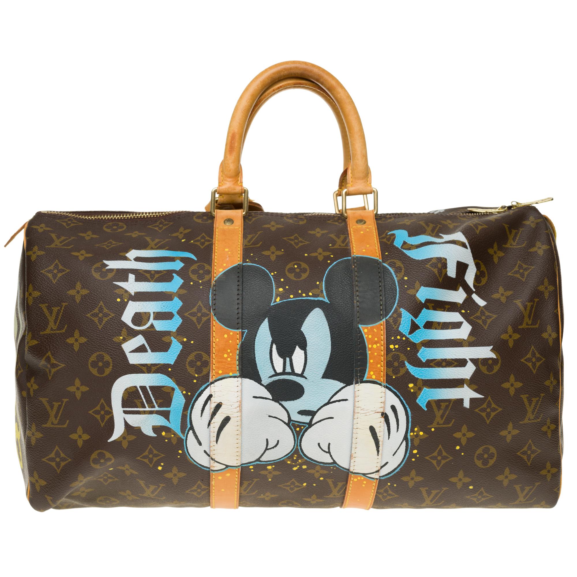 Superb travel bag Louis Vuitton Keepall 45 cm in Monogram canvas customized by the trendy artist of Street Art Patbo on the theme 