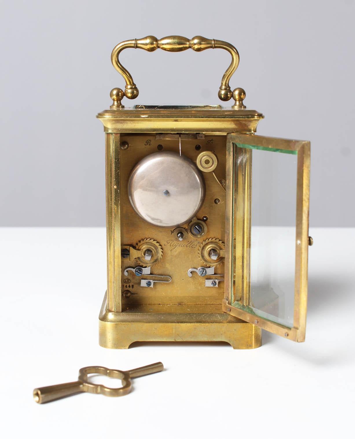 Pendulette de Voyage

Paris - Geneva
Brass, glass, enamel
around 1900

Dimensions: H x W x D: 12 x 9 x 8 cm

Description:
5-sided glazed carriage clock. Travel- or carriage clock with half hour and hour strike on bell.

Enamel dial with