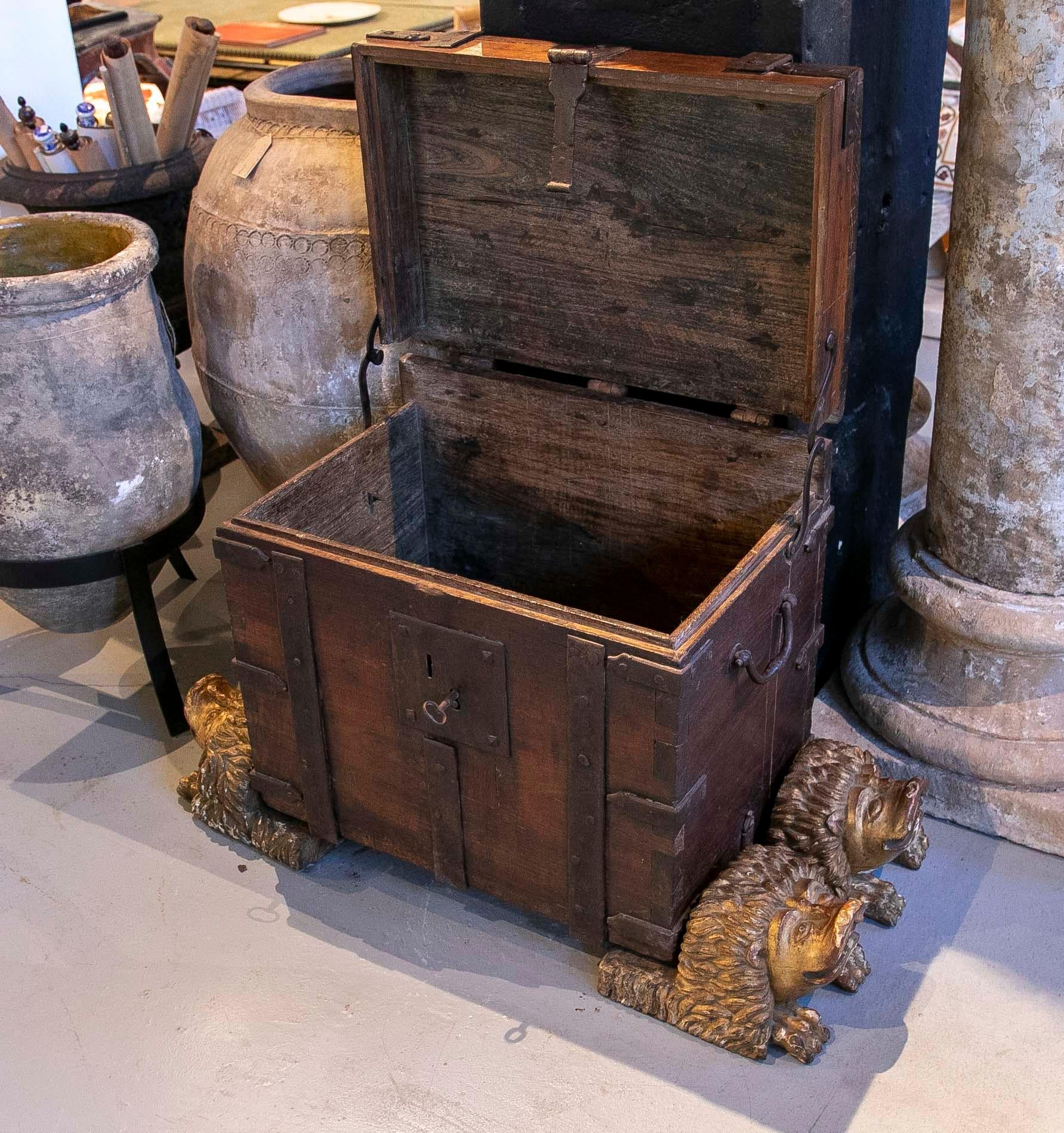 Hand-Carved Travel Chest with Original Iron Fittings and Lion Paws