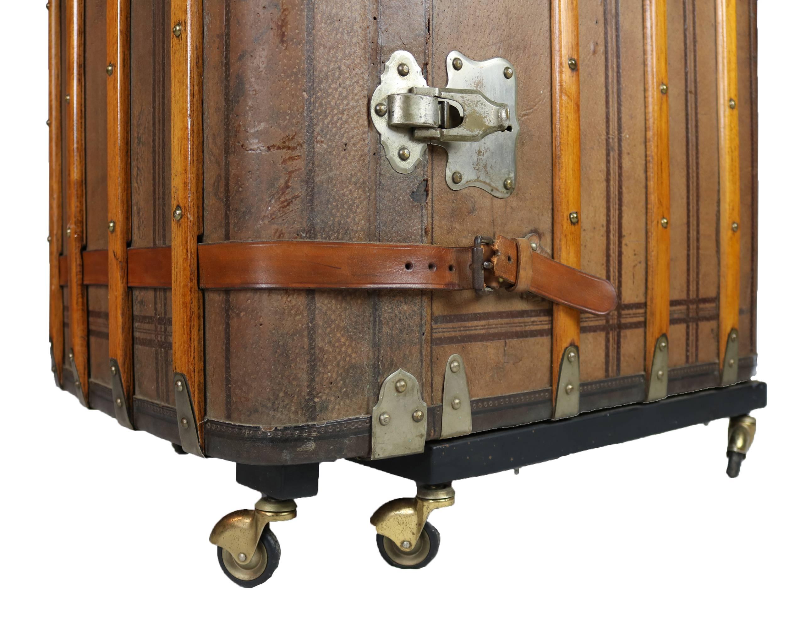 Good 20th century Travel Trunk sympathetically converted to a bar. The case bound in ash with nickel and brass fittings. It has a later bespoke interior with provision for glasses, bottles and decanters.