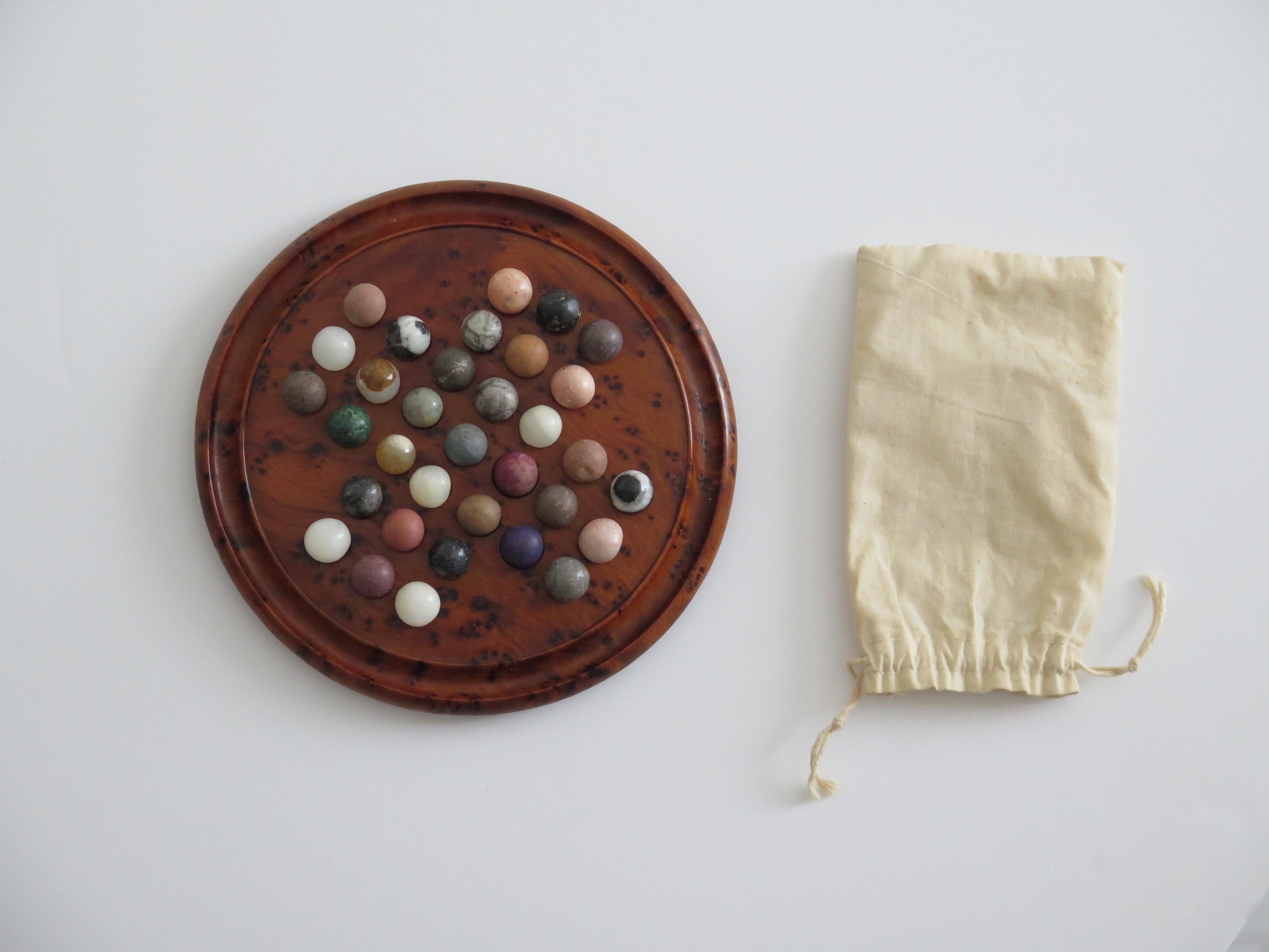 Travelling Marble Solitaire Board Game with 33 early stone Marbles, circa 1920 5