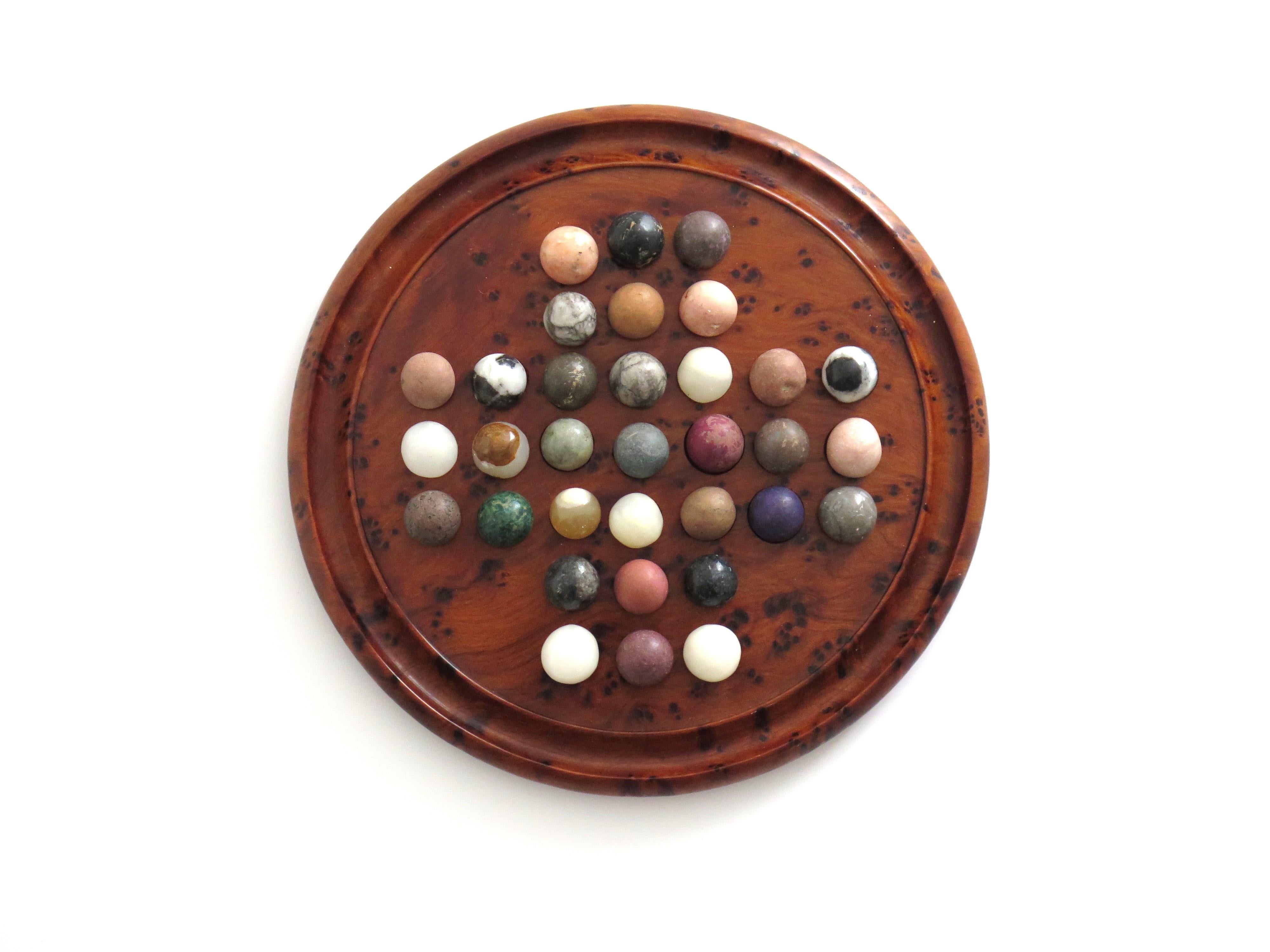 English Travelling Marble Solitaire Board Game with 33 early stone Marbles, circa 1920