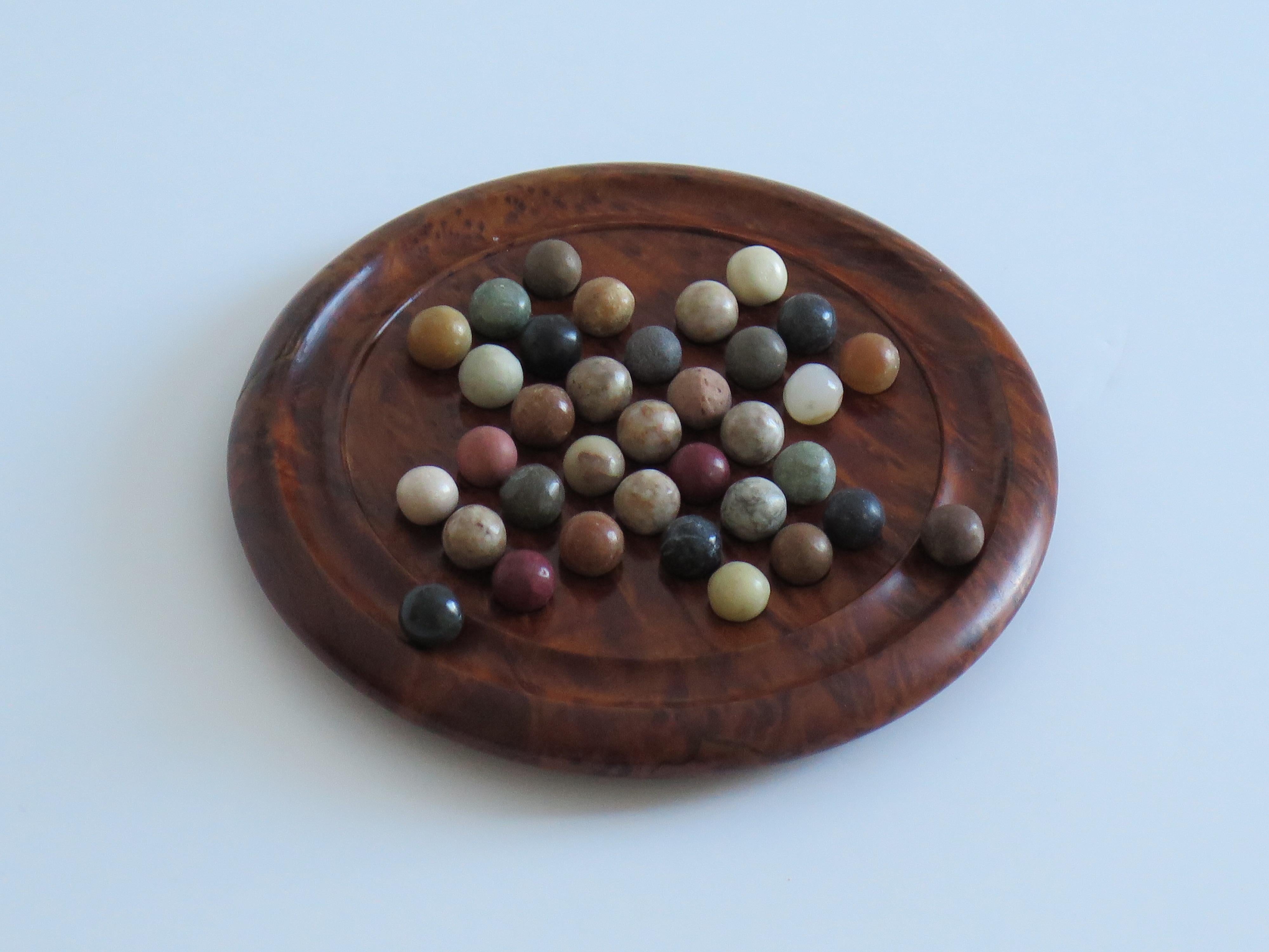 Art Deco Travelling Marble Solitaire Board Game with 35 mixed stone Marbles, Circa 1930 For Sale
