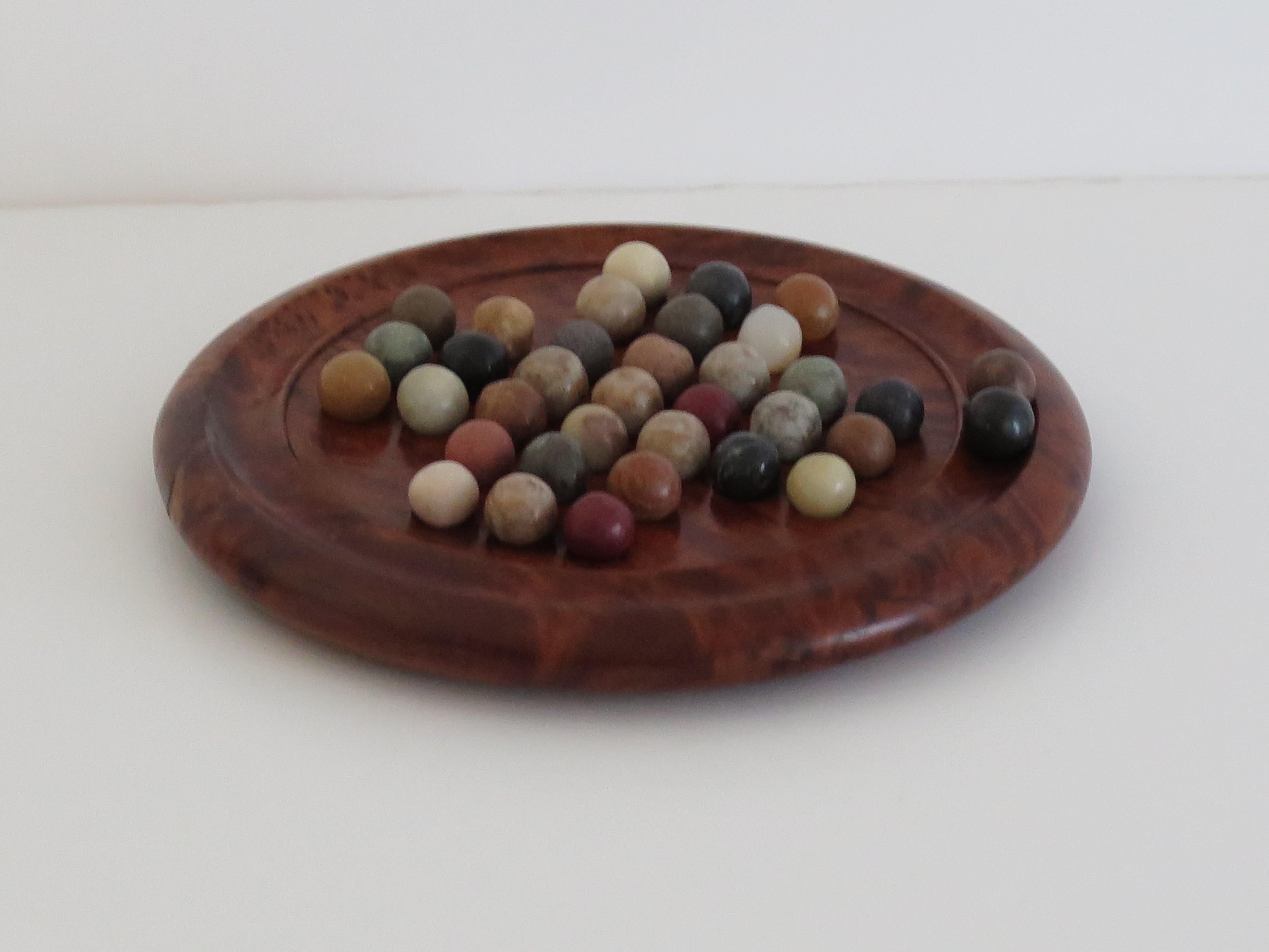 English Travelling Marble Solitaire Board Game with 35 mixed stone Marbles, Circa 1930 For Sale