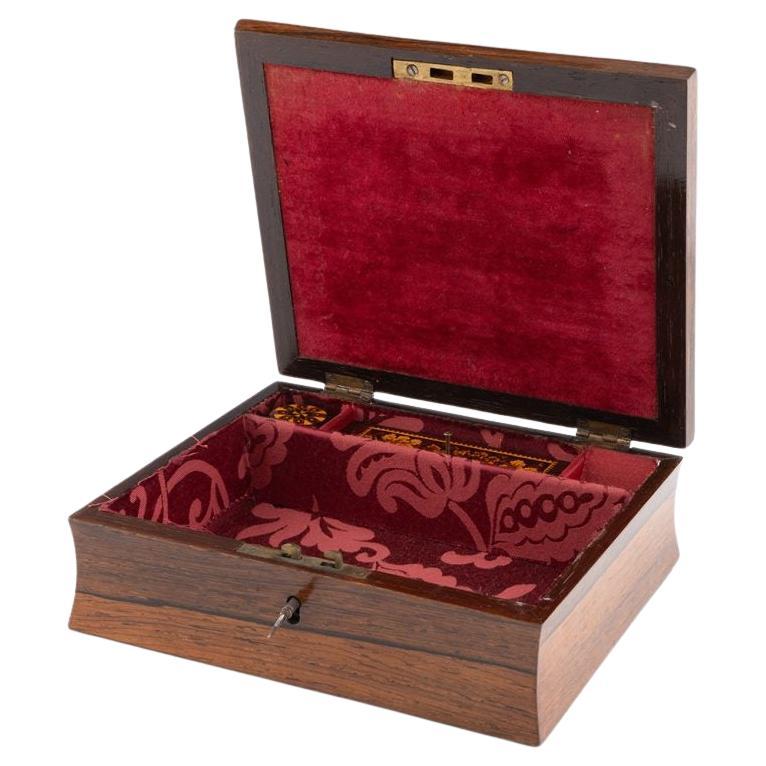 Heading : Travelling Tunbridge ware writing slope Edmund Nye c1860

Date : c1860

Period : Victoria

Origin : Tunbridge Wells, Kent

Decoration : Central floral mosaic within keylines, floral belrin woolwork banding to the border. Internally there