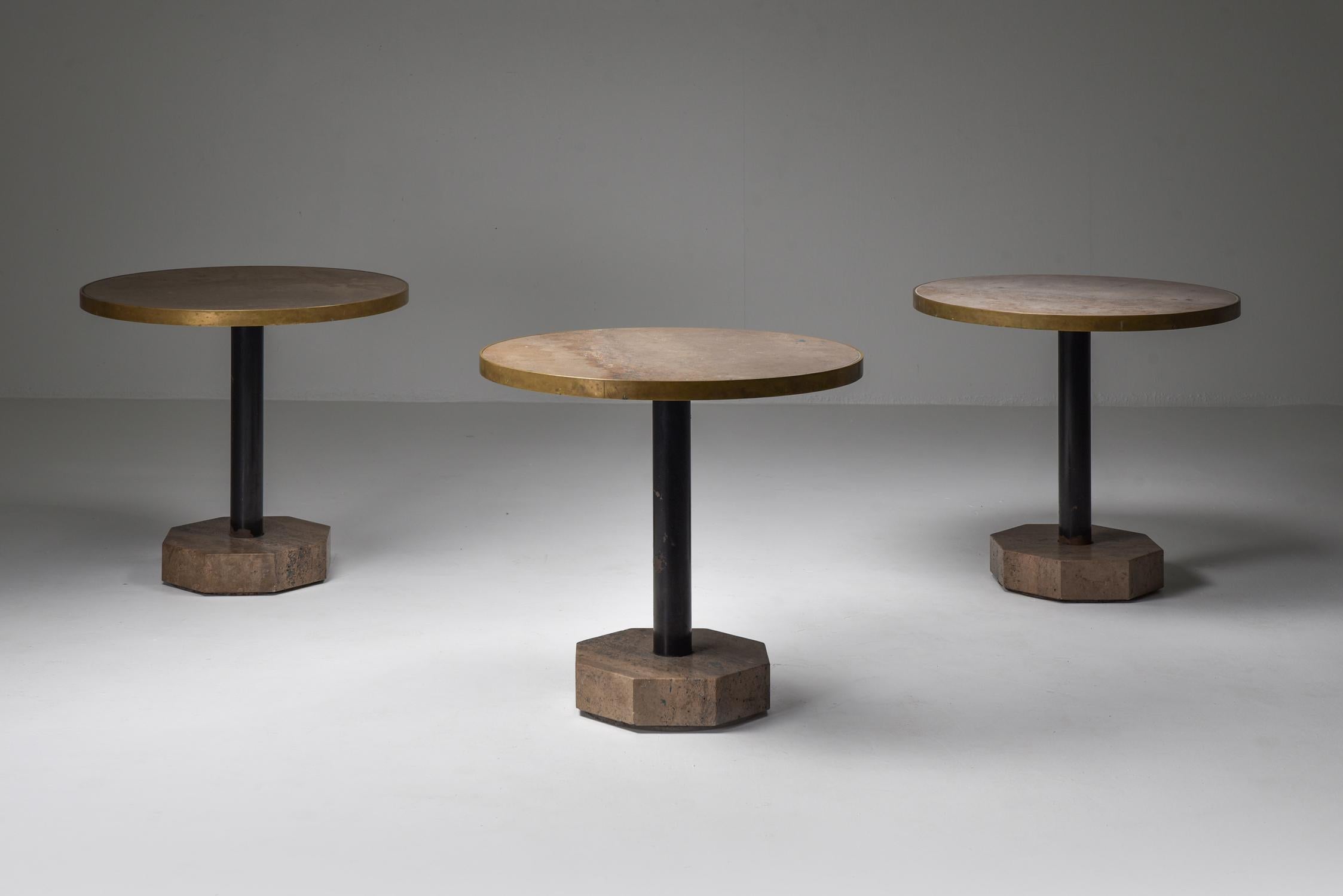 Travertine, brass, steel, bistro or terrace table, Italy 1970s

A solid octagonal block of Iranian travertine forms the base of these chic bistrot tables, 
a steel cylinder connects to the round top which is finished with a brass rim

These