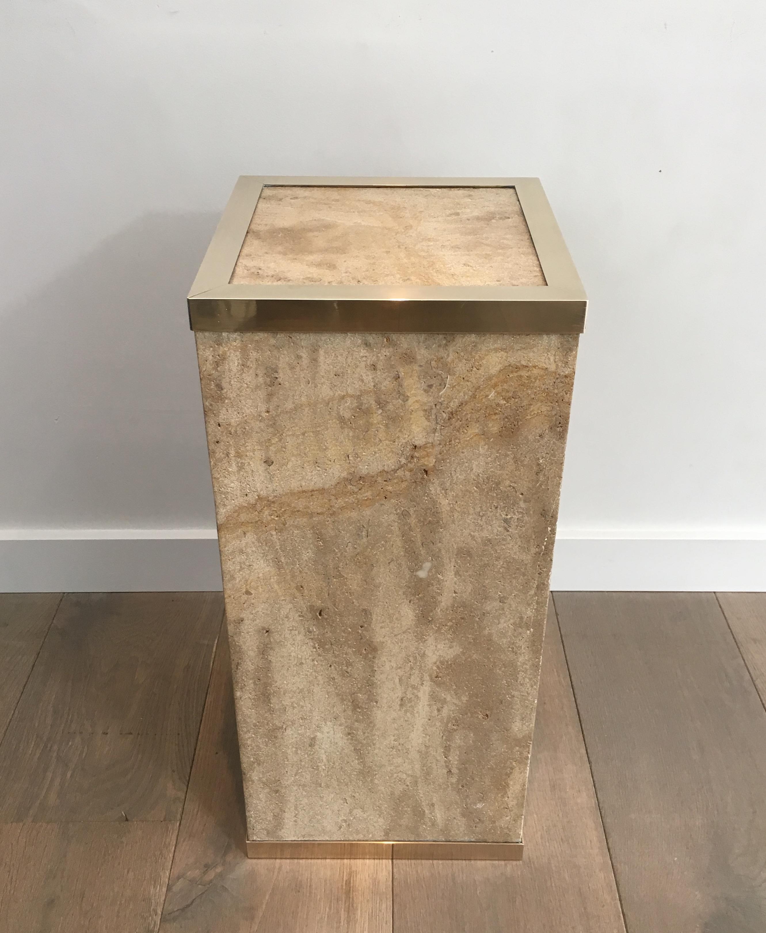 This nice rectangular column is made of travertine with a brass frame on top. This is a French work, circa 1970.