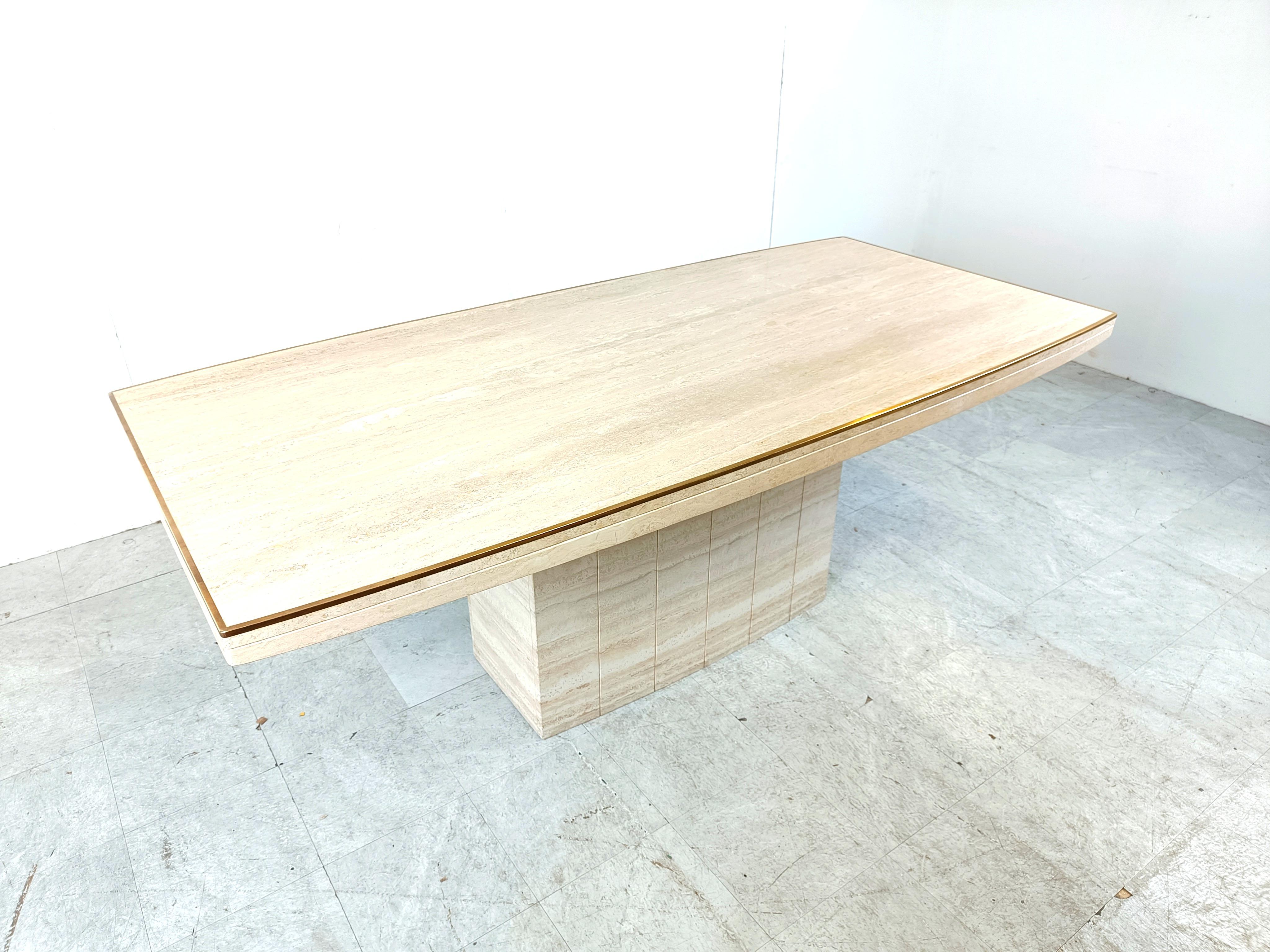 Large travertine and brass edge dining table in the manner of Willy Rizzo by Jean Charles.

Good eye catching dining table. 

Good condition.

1970s - Italy

Height: 78cm
Width: 210cm
Depth: 100cm

Ref: 203124