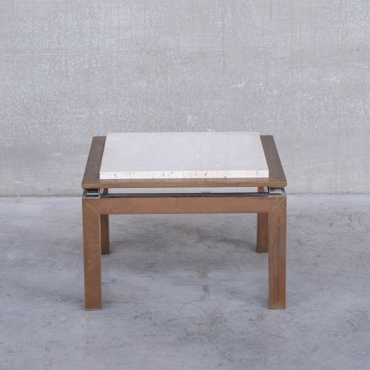 A small coffee table or side table. 

France, c1960s. 

Naturally patinated brass and travertine top, providing a pleasing contrast of tones. 

Good condition, some scuffs and wear commensurate with age. 

Location: Belgium