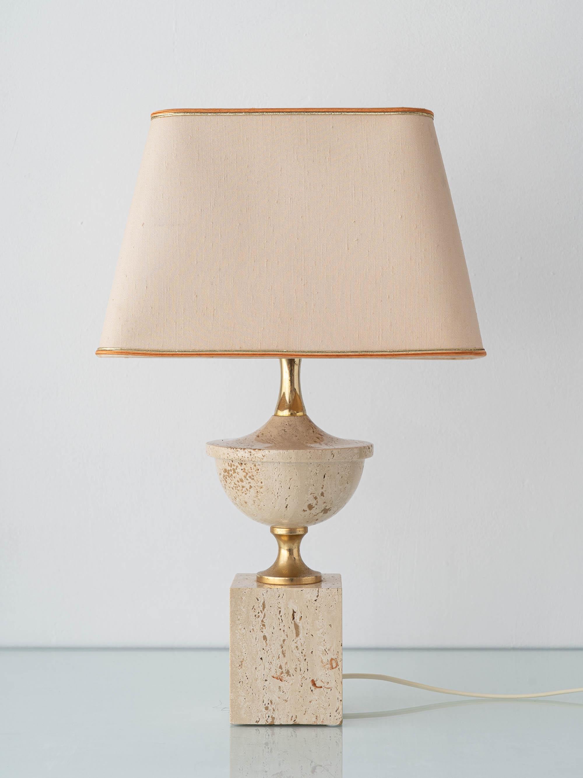 Elegant travertine and brass table lamp, attributed to Philippe Barbier (Maison Barbier), Italy, circa 1970. The sculptural design pairs a travertine cube base with a turned travertine bowl and a slender gilt-brass neck, forming a balanced,