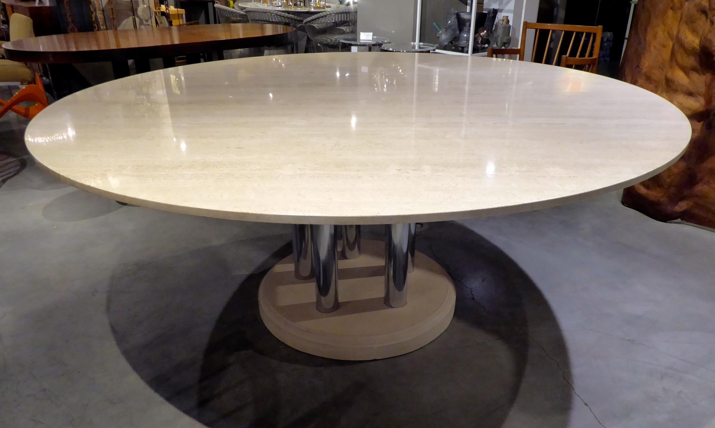 A travertine and chrome-plated steel circular dining table (style #7003) made by Pace Collection in the 1970s. The table was a custom travertine version of the 7000 series conference or dining table. An original quarter-inch thick glass top