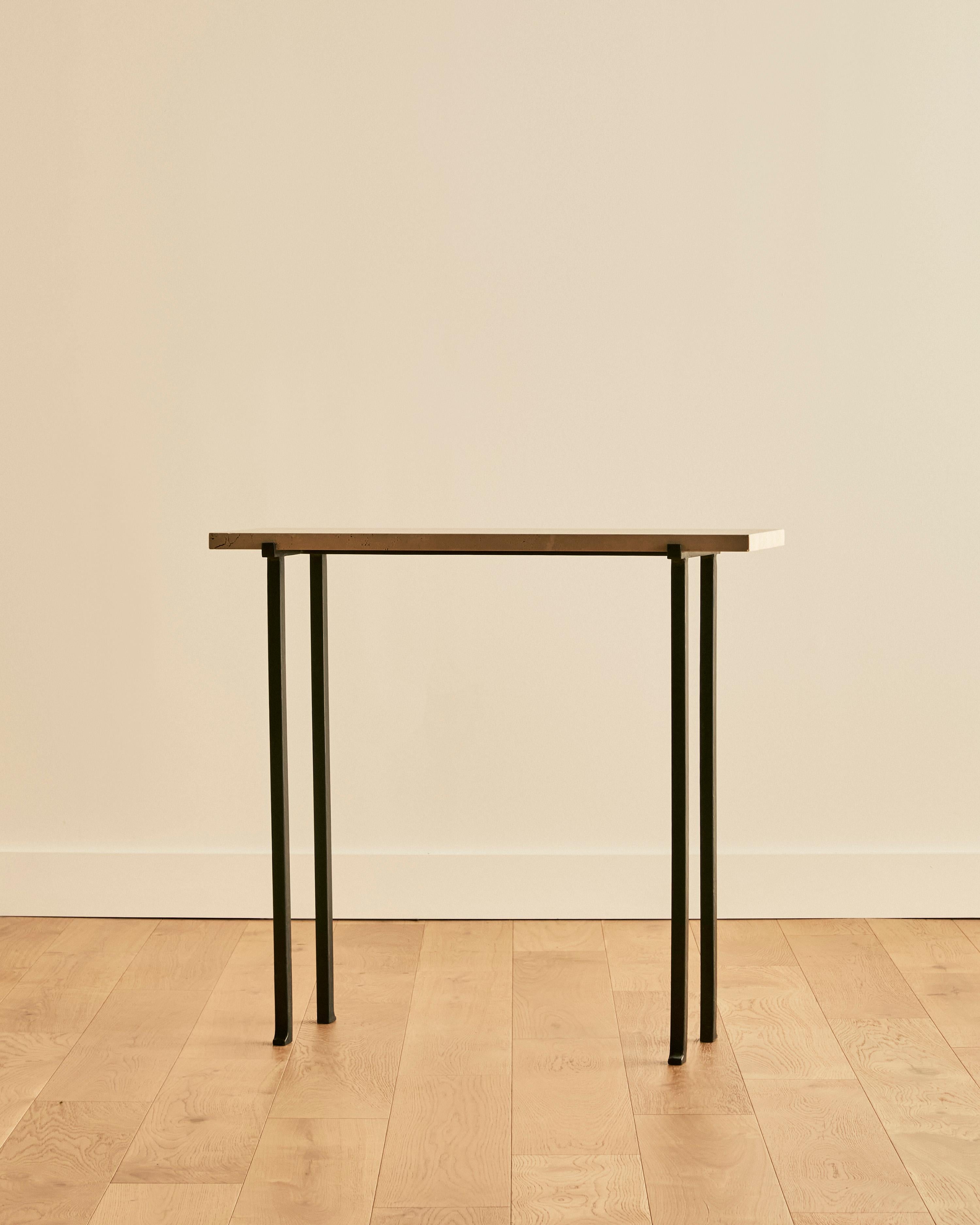 Travertine and forged steel console. Two available, sold separately. 