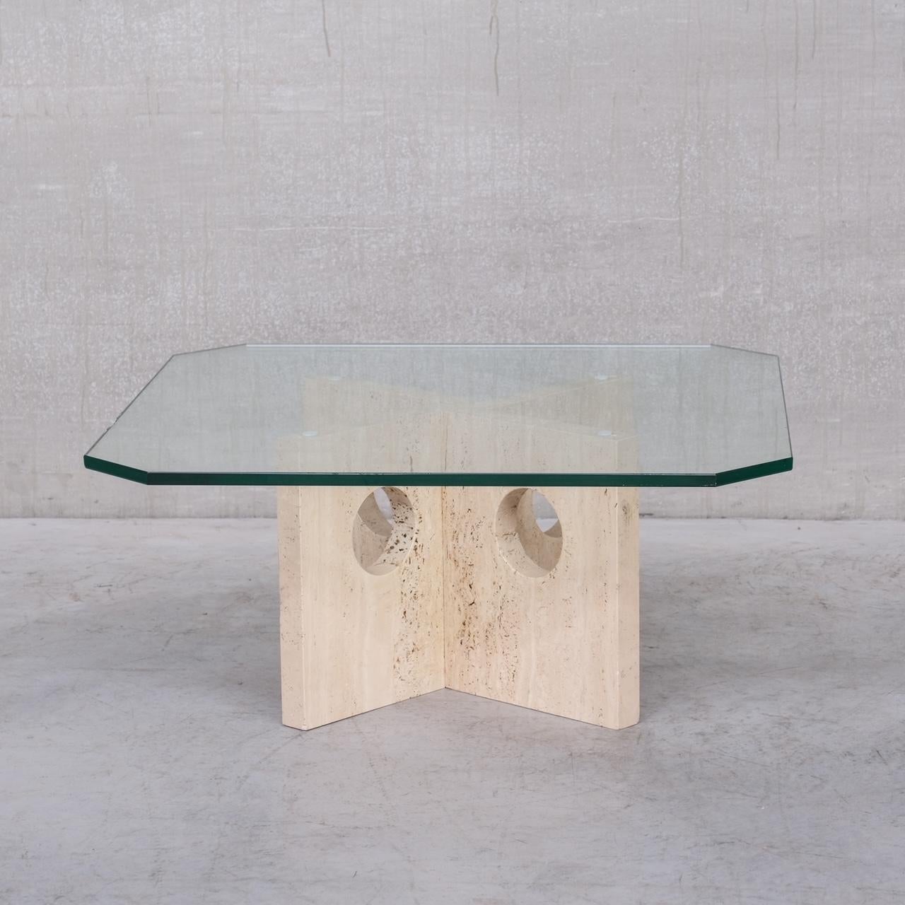 A travertine based coffee table with a glass top. 

Italy, c1970s. 

Likely by Up&Up, Italy. 

The travertine has circular recesses. 

Good vintage condition. 

Location: Belgium Gallery. 

Dimensions: 45 H x 100 W x 100 D in cm.

Delivery: POA

We