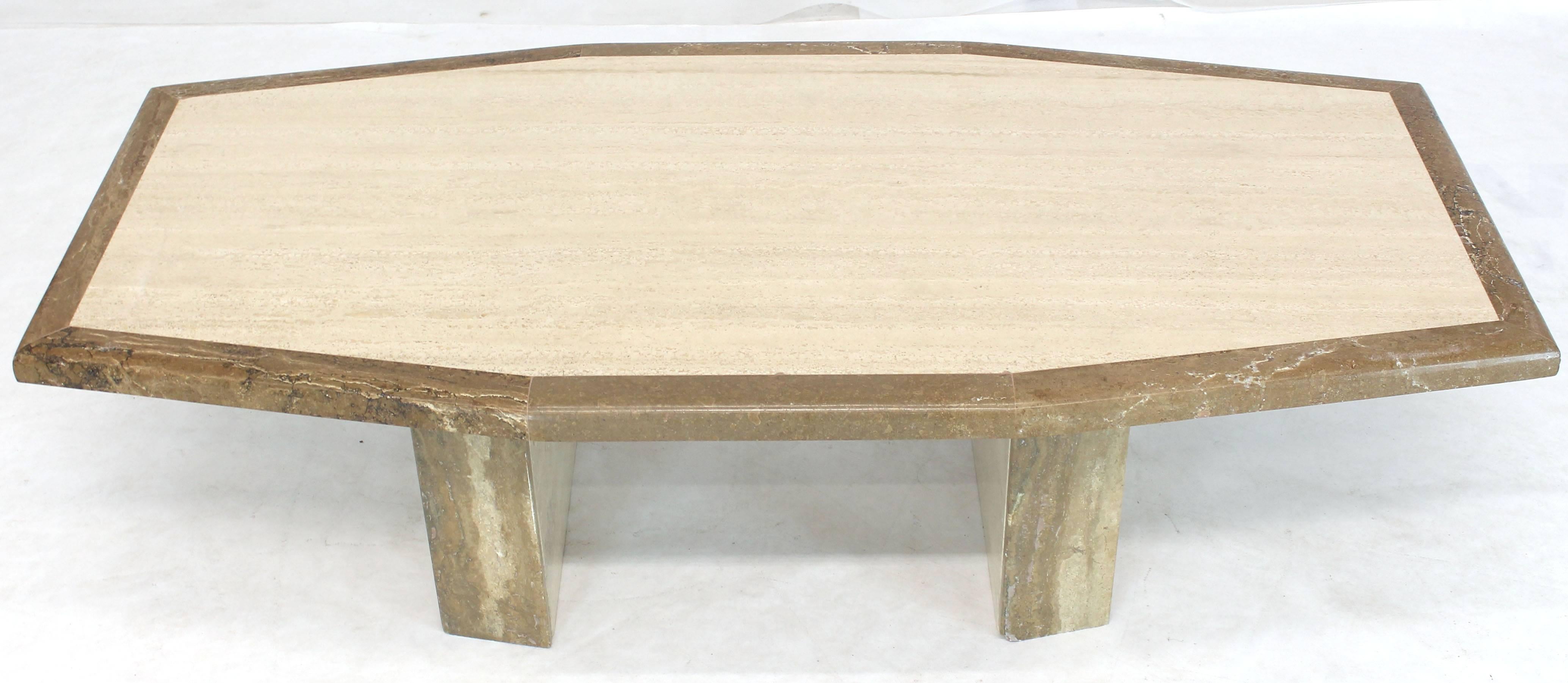 Mid-Century Modern two-tone travertine and marble large boat shape cut rectangle coffee table. Double pedestal stone base.