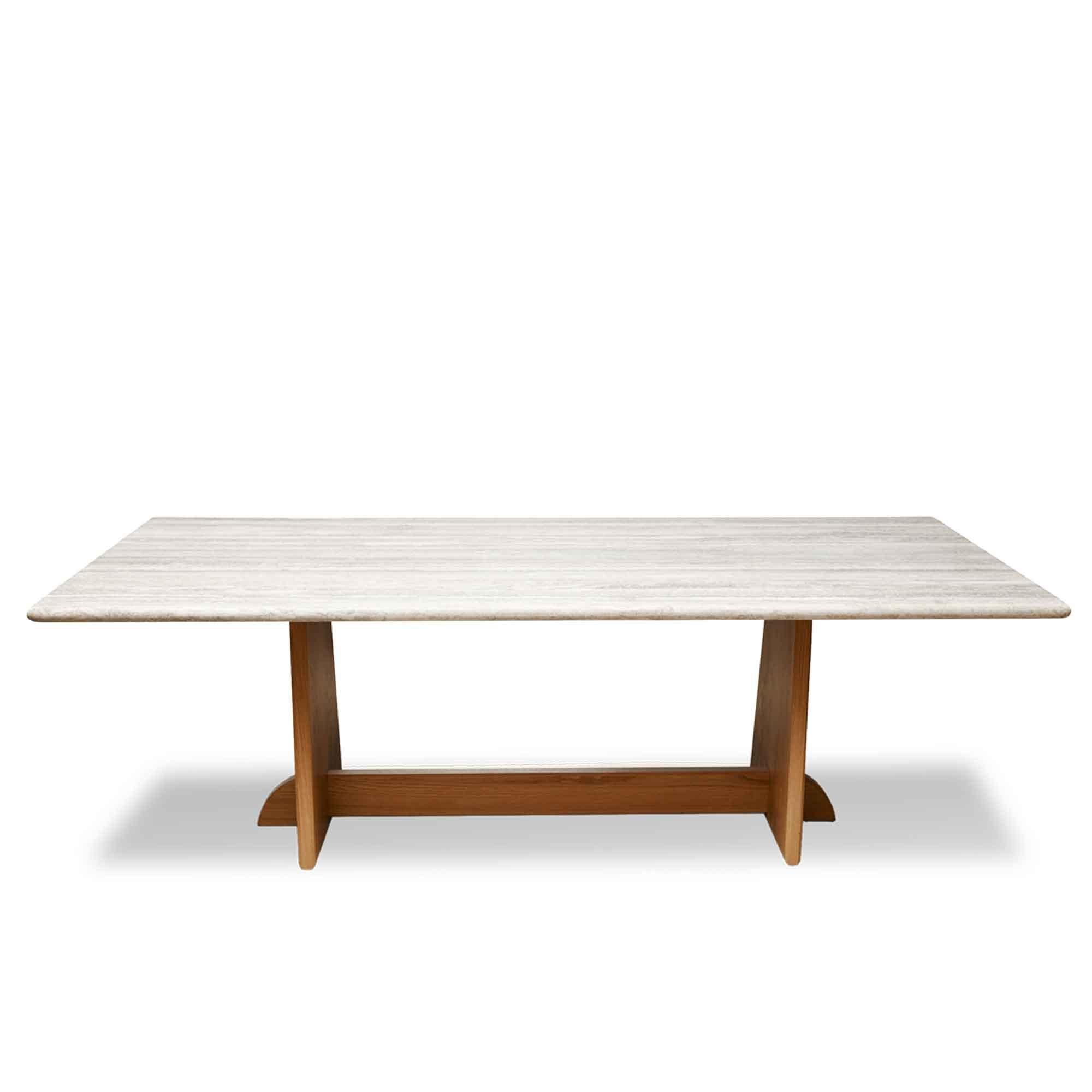 The Ojai dining table features a trestle base made of solid wood and the option of a stone or solid wood top. Available in three standard sizes. 

 The Lawson-Fenning collection is designed and handmade in Los Angeles, California. Reach out to