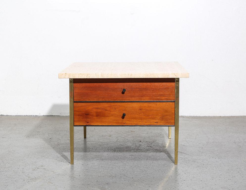 Vintage end table designed by Milo Baughman for Arch Gordon. Polished travertine top with brass frame and walnut drawers. Dainty ebonized wood pulls.