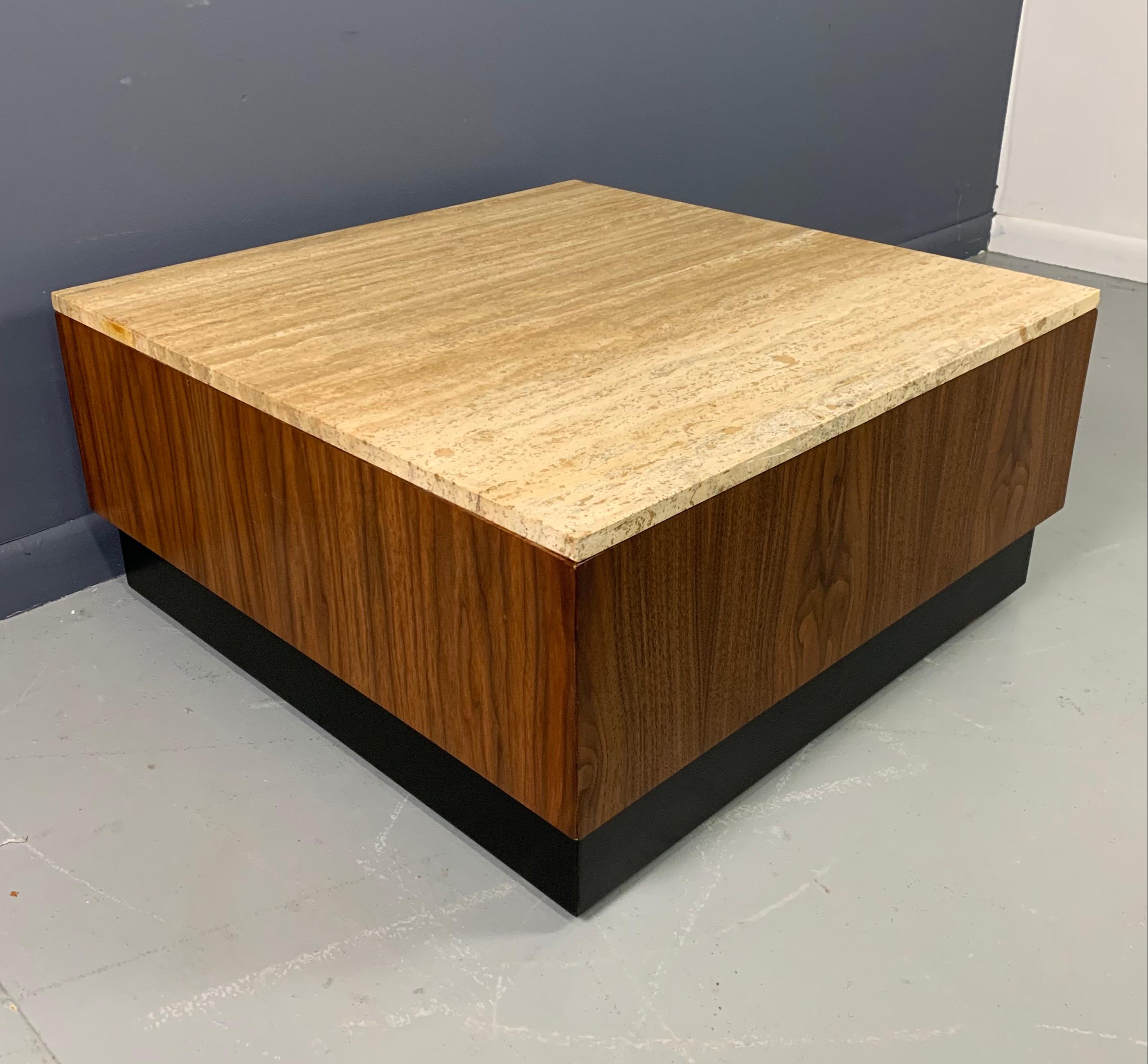 Classic midcentury coffee table with a twist, the travertine and walnut is a wonderful combination.