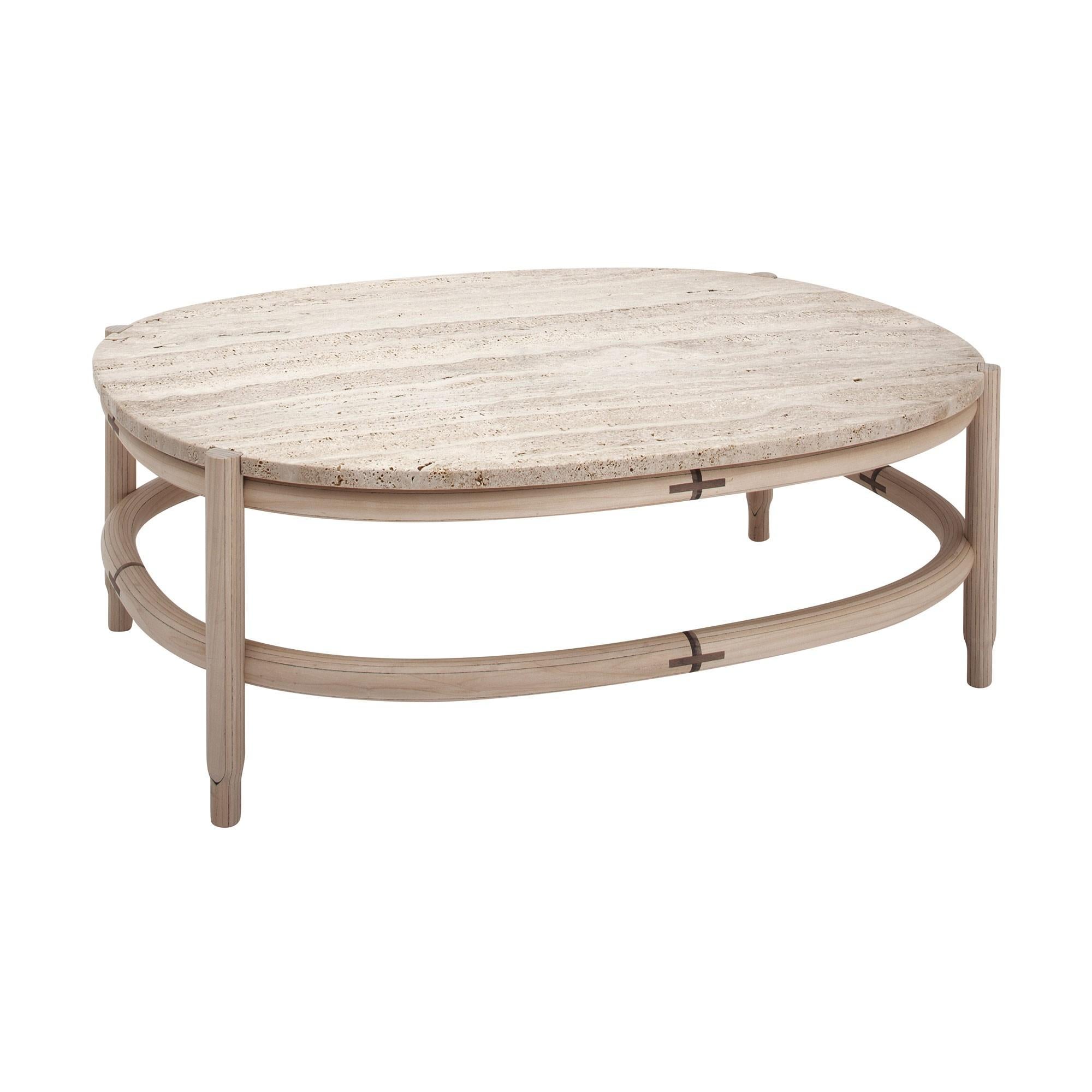 Design travertine and wood coffee table combining tradition and innovation: a round plywood structure with pencils feet and a carrare travertine marble.