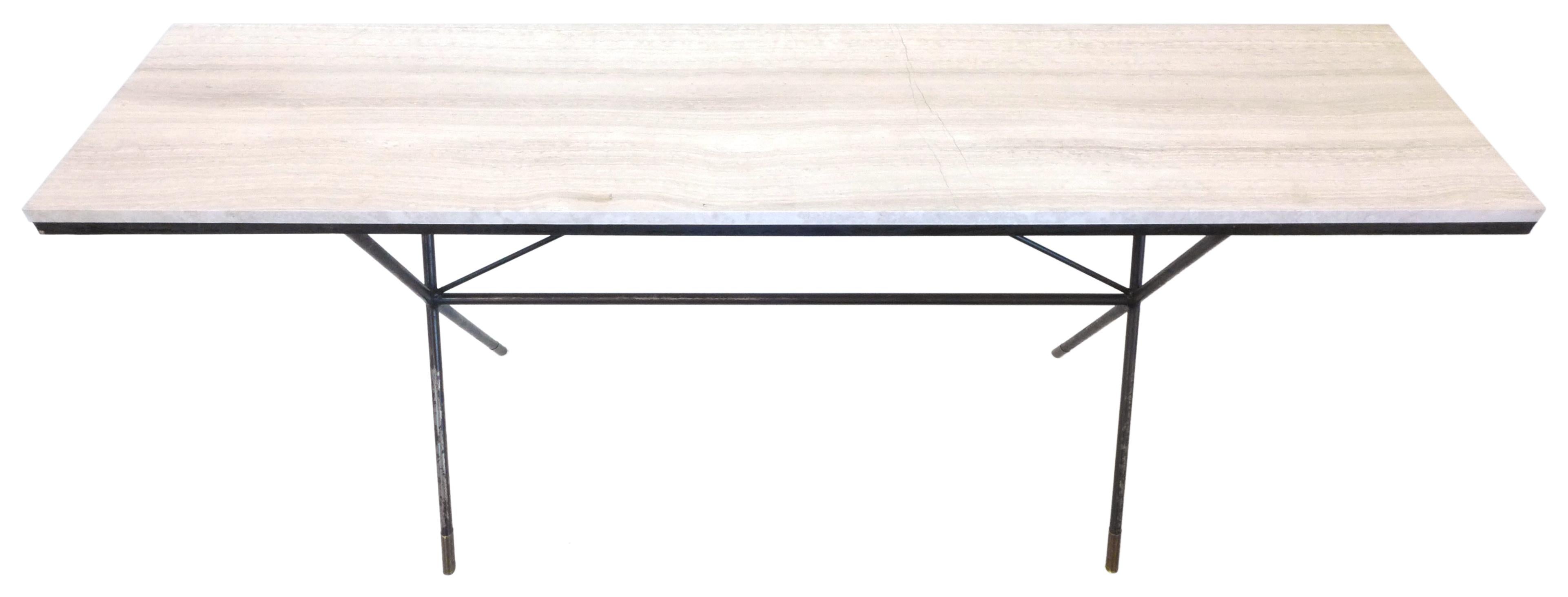 A fantastic travertine and wrought iron console table. An elegant, mottled-black, architectural base with x-brace legs, radiating cross-stretchers, and brass-capped feet topped with a contemporary, subtly-striated, oatmeal travertine top. Great
